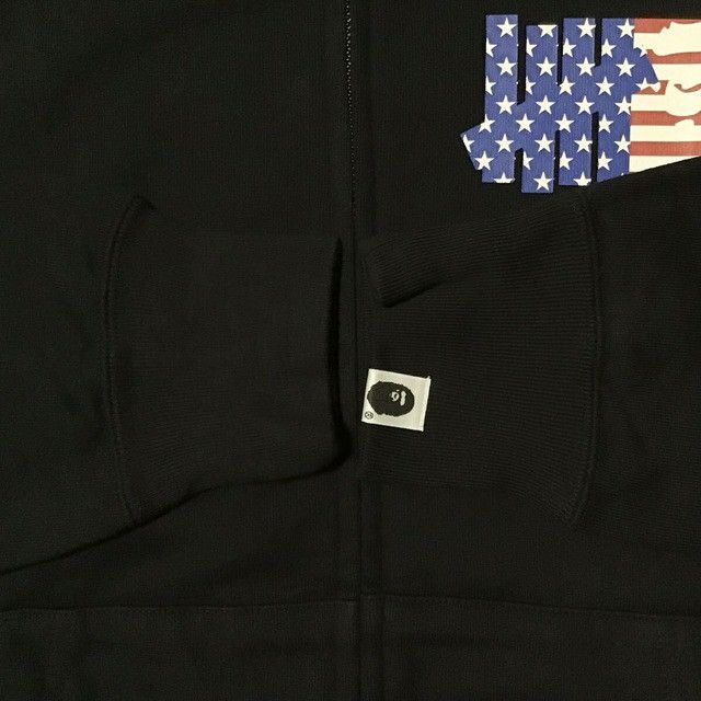 Bape × Undefeated Undefeated × BAPE HEAD LOGO full zip hoodie a bathing ape Size US L / EU 52-54 / 3 - 7 Thumbnail