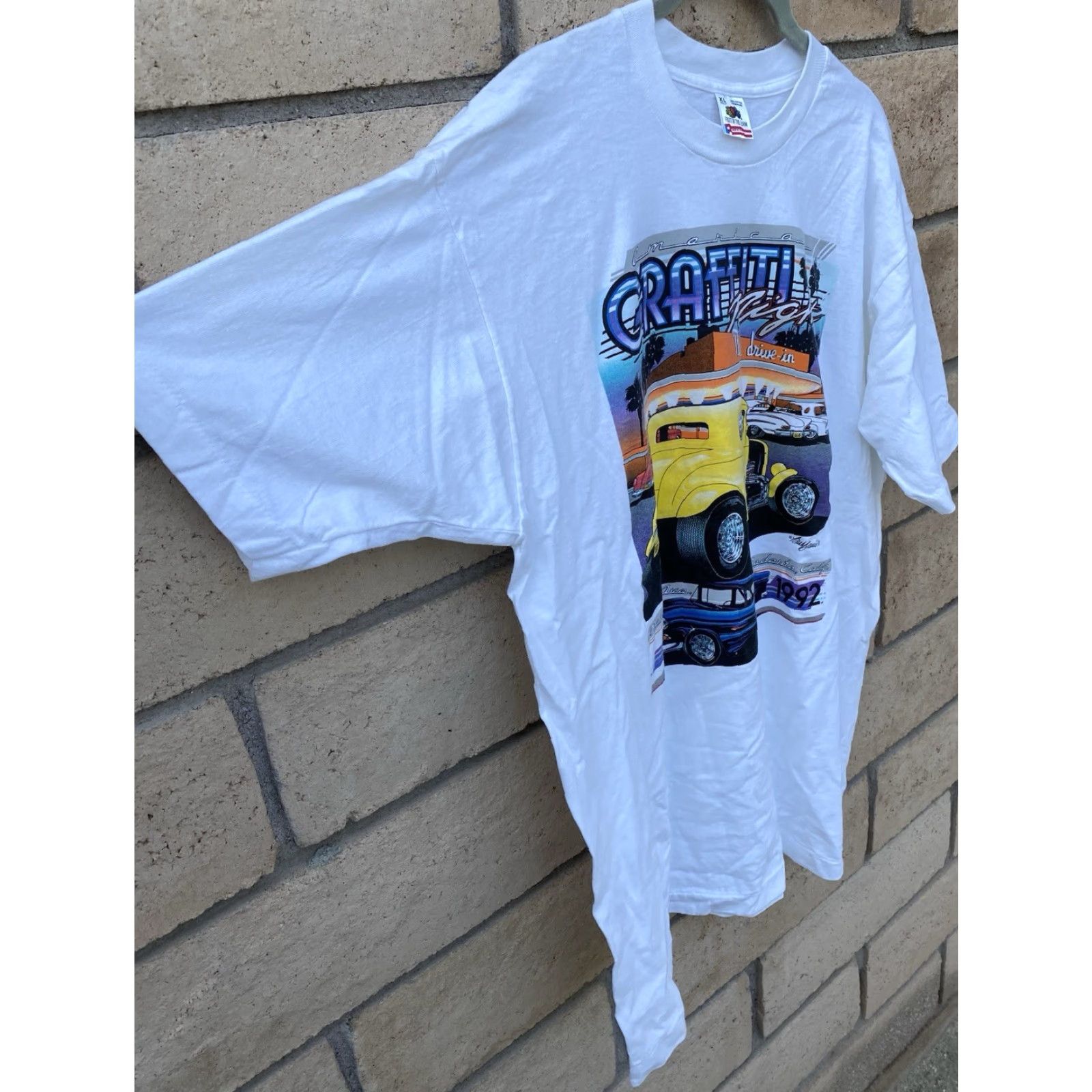 Fruit Of The Loom VINTAGE American Graffiti Night Mels Deive In Modesto 1992 T-Shirt Tee XL White USA 90s Cars City Thread: Fruit of the Loom Men T-Shirt Size US XL / EU 56 / 4 - 7 Thumbnail
