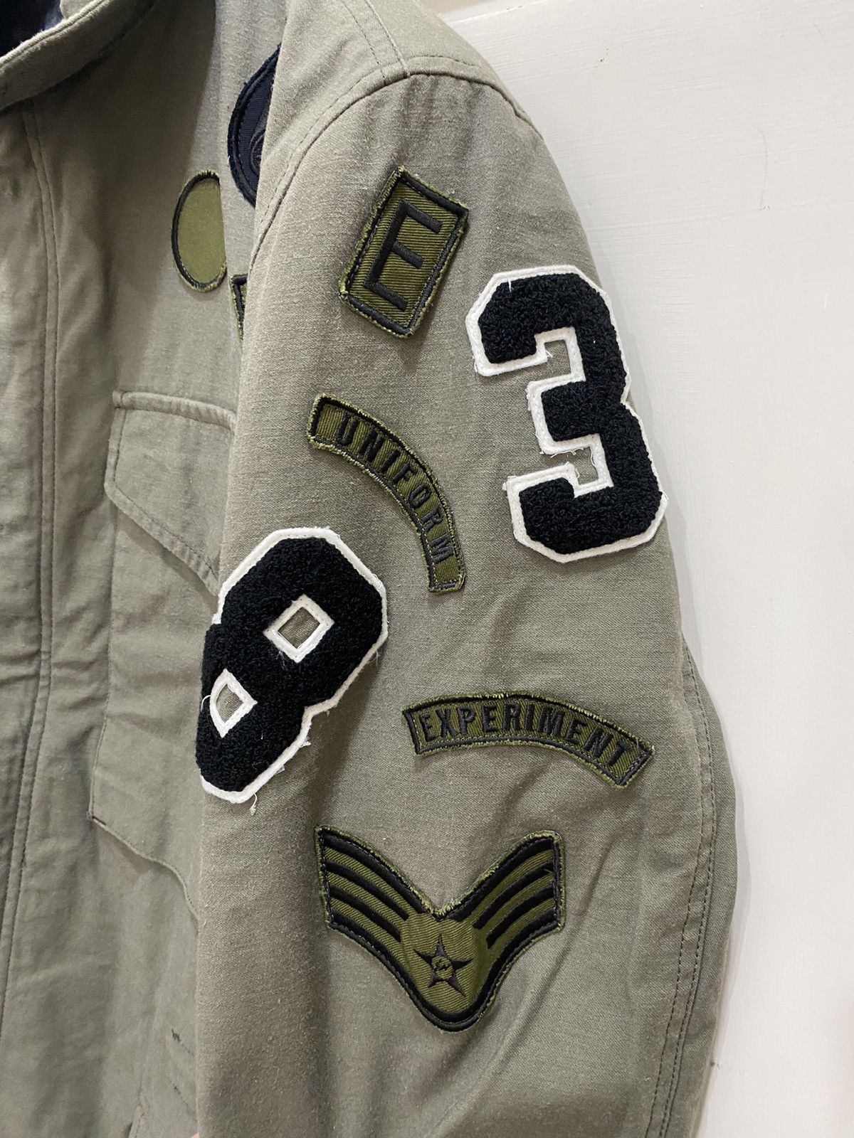 uniform experiment Rare Uniform Experiment M-51 Multi Wappen Parka, L used Size US L / EU 52-54 / 3 - 7 Thumbnail