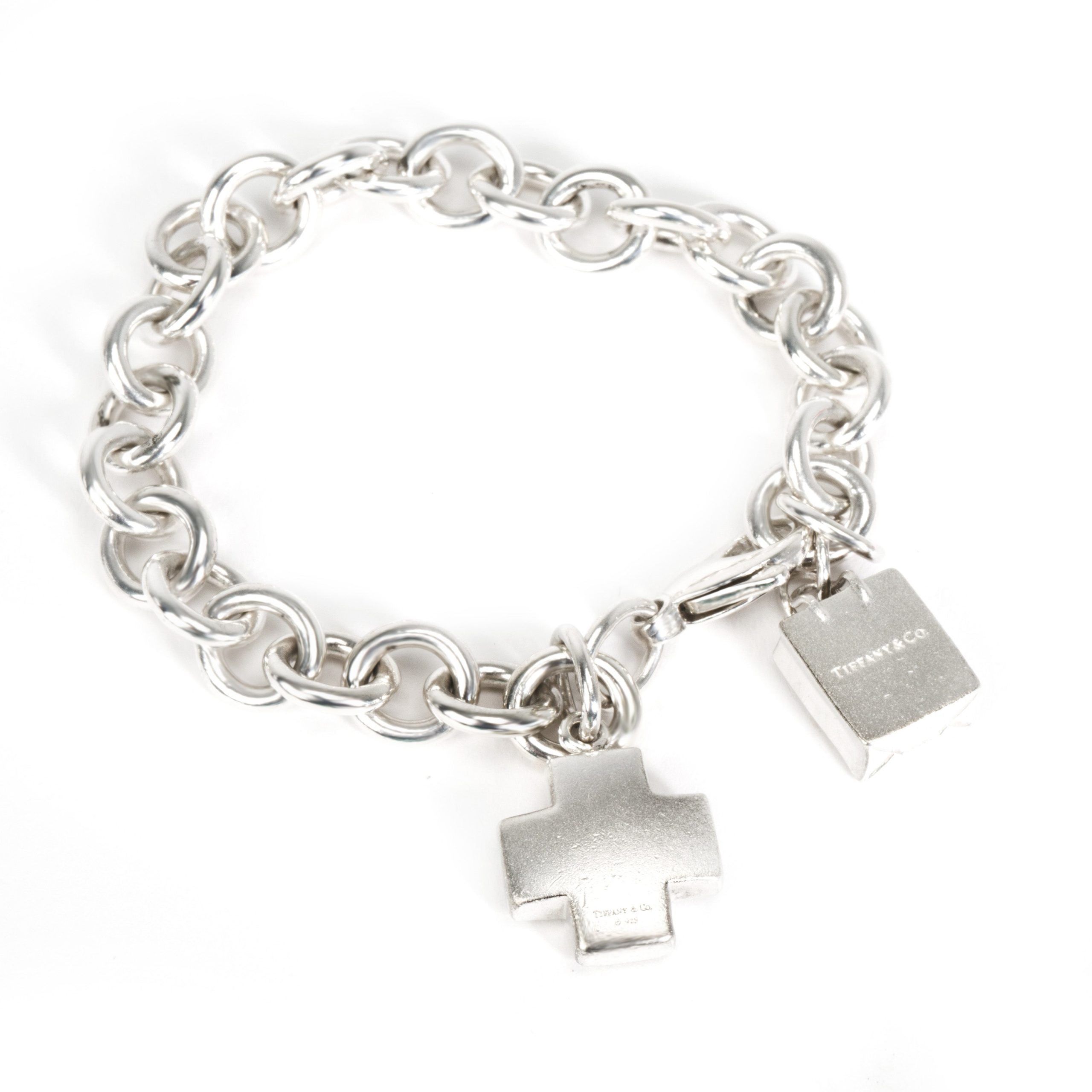 image of Tiffany Co Tiffany & Co. Shopping Bag & Cross Charm Bracelet In Sterling Silver, Women's