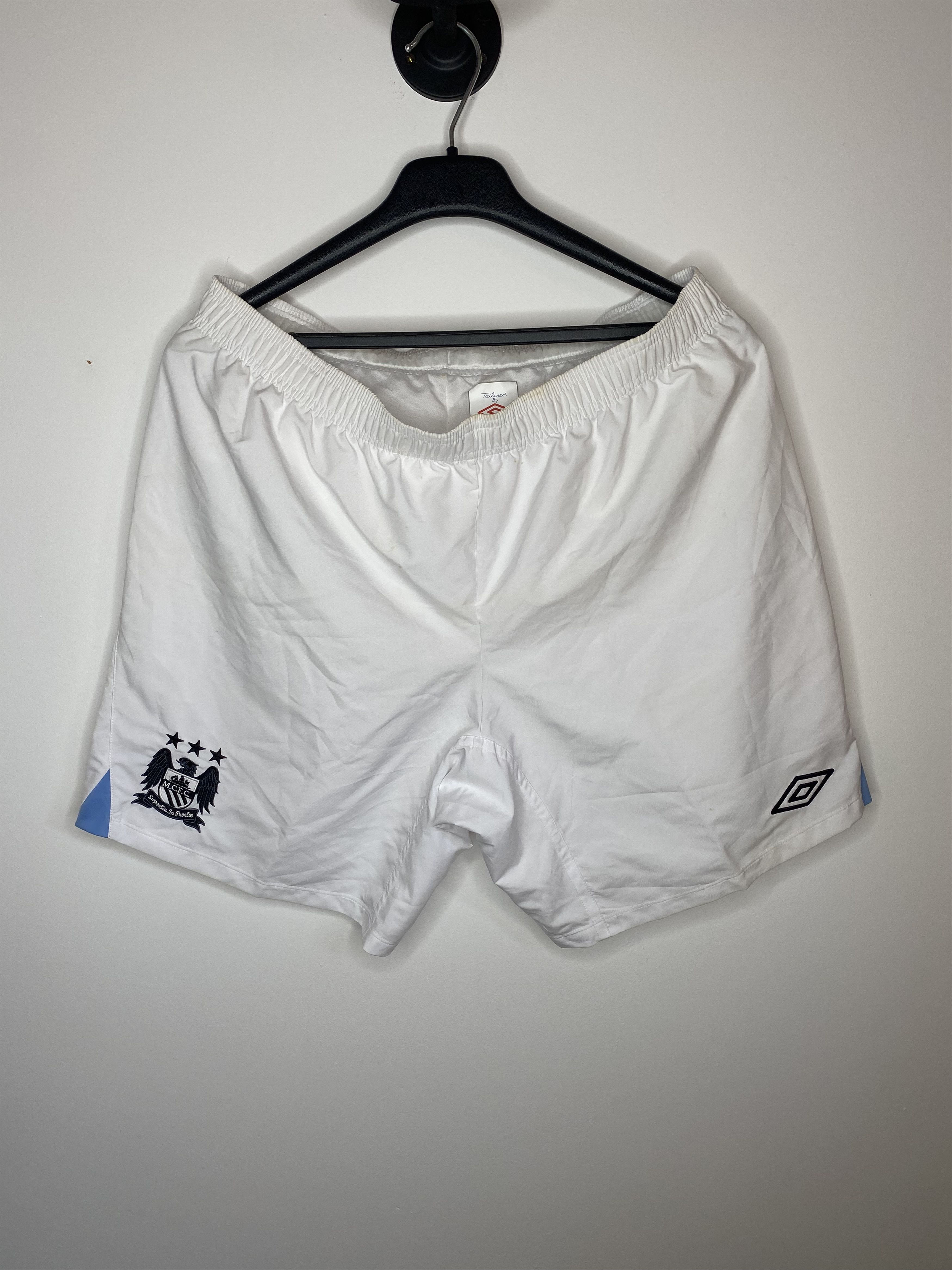 Nike MANCHESTER CITY 2012 2013 HOME FOOTBALL SOCCER SHORTS UMBRO Size US 34 / EU 50 - 1 Thumbnail