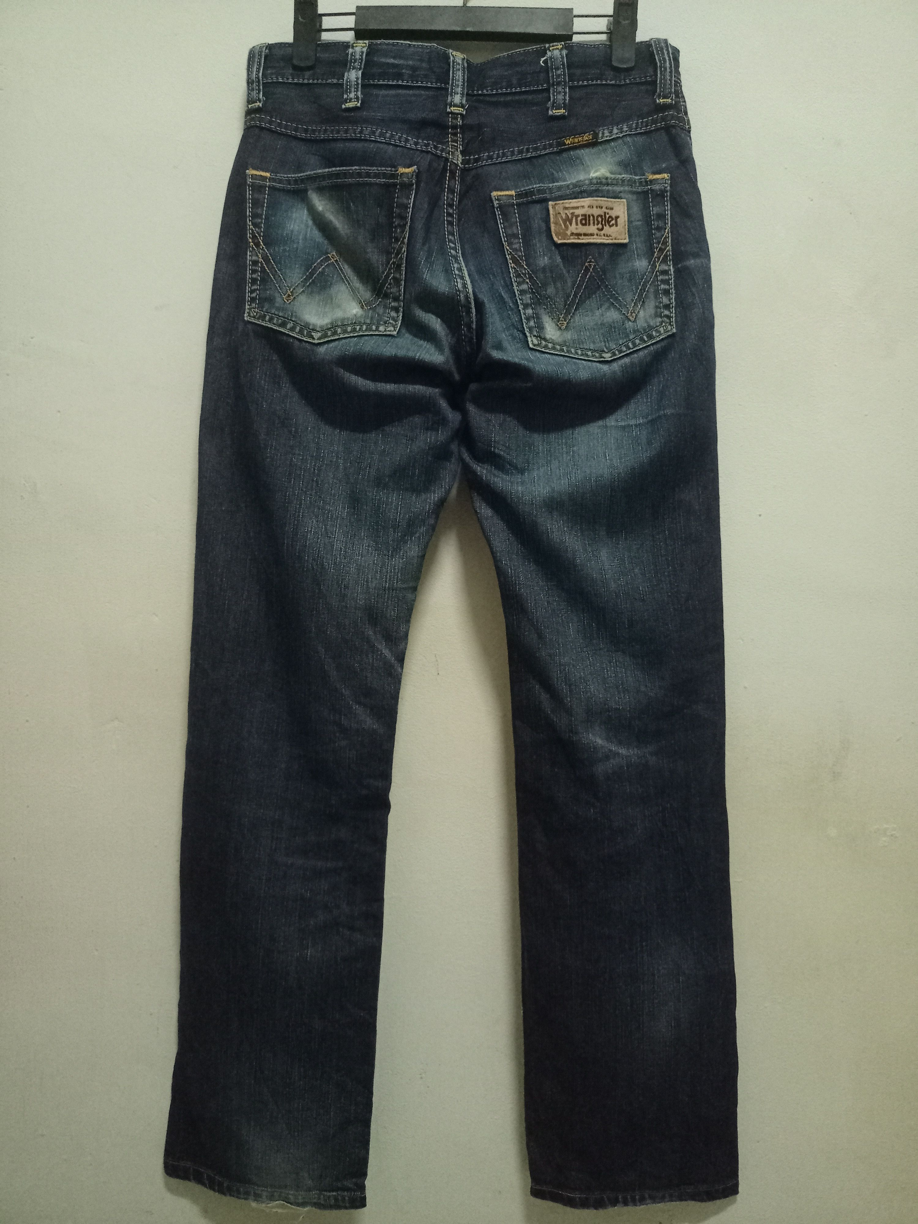 Vintage Wrangler Indigo Mud Wash Distressed Jeans 29x29