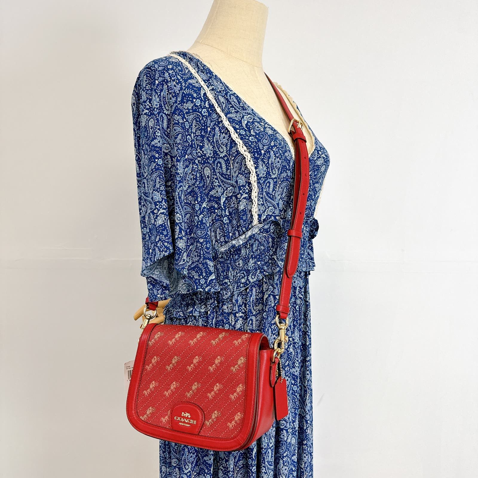 image of Coach C4059 Saddle Bag With Horse And Carriage Dot Print in Red, Women's