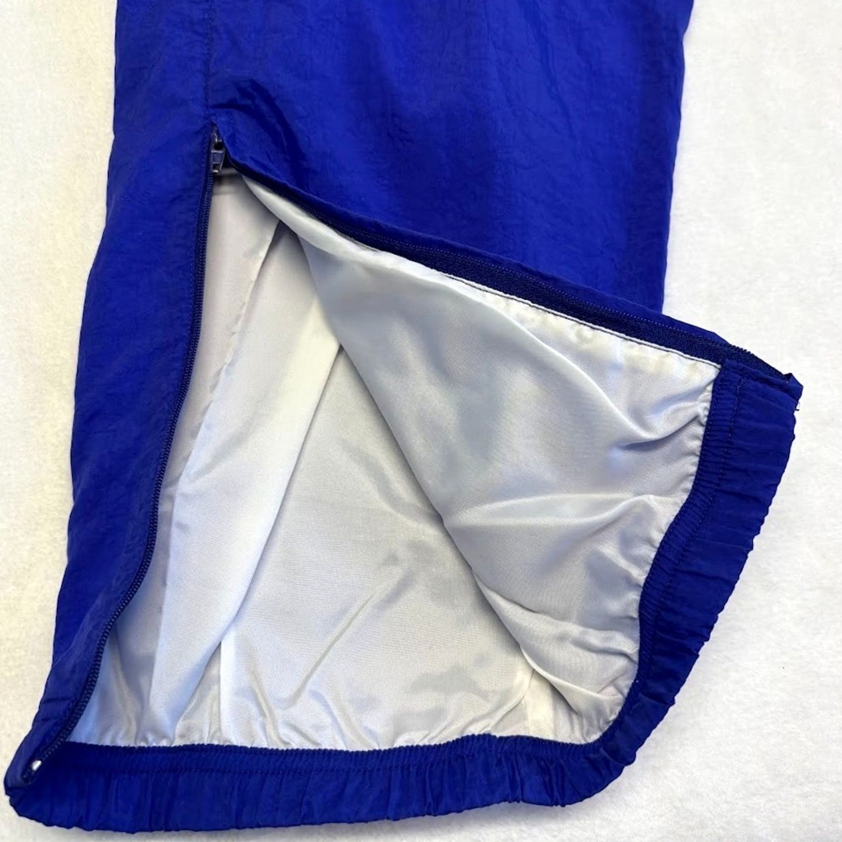 Nike VINTAGE Nike Track Pants M Blue Nylon Windbreaker Ankle Zip Embroidered Swoosh Size US 31 - 6 Thumbnail