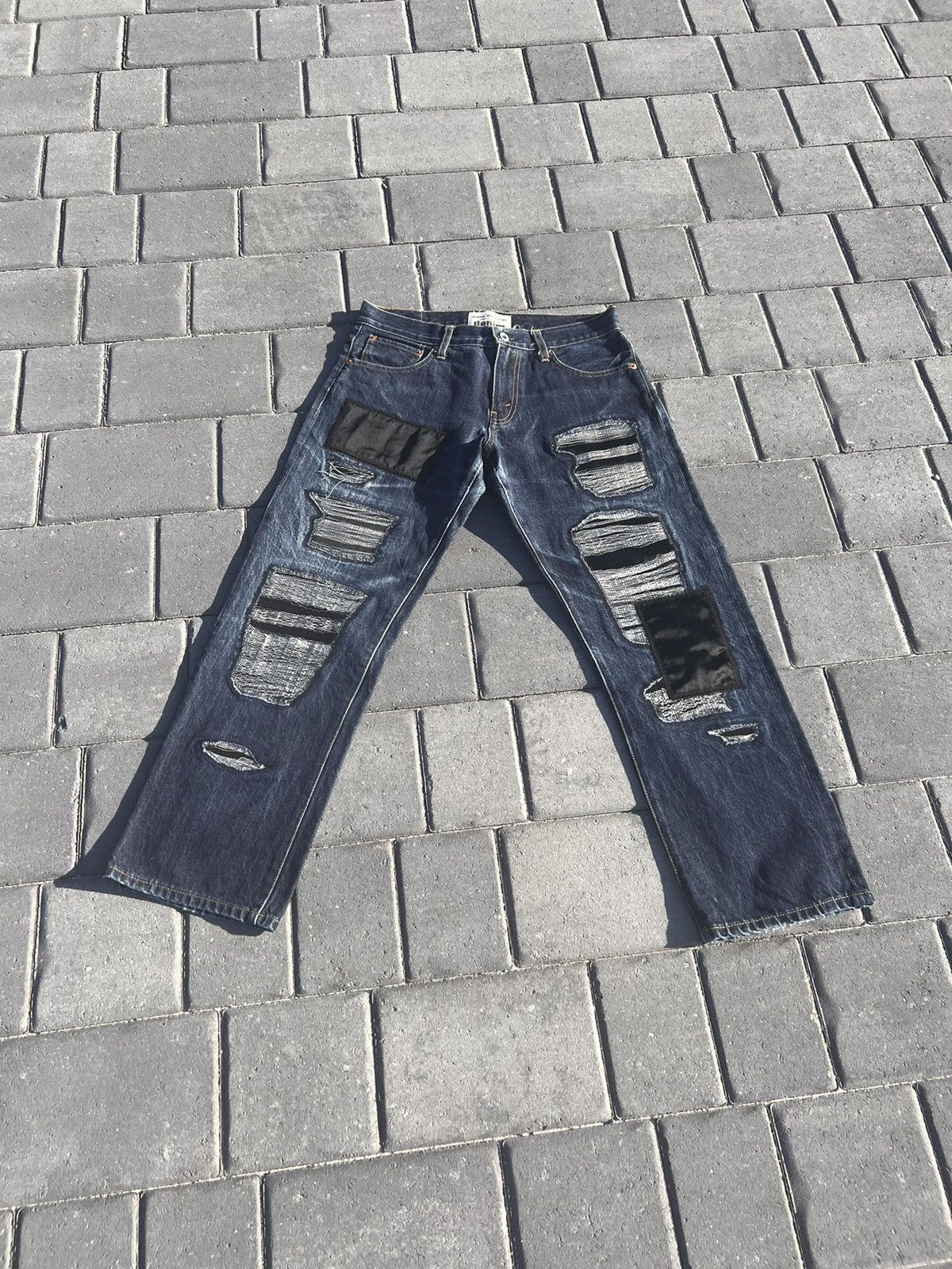 image of Comme Des Garcons x Junya Watanabe Patched Ripped Jeans in Blue, Men's (Size 28)