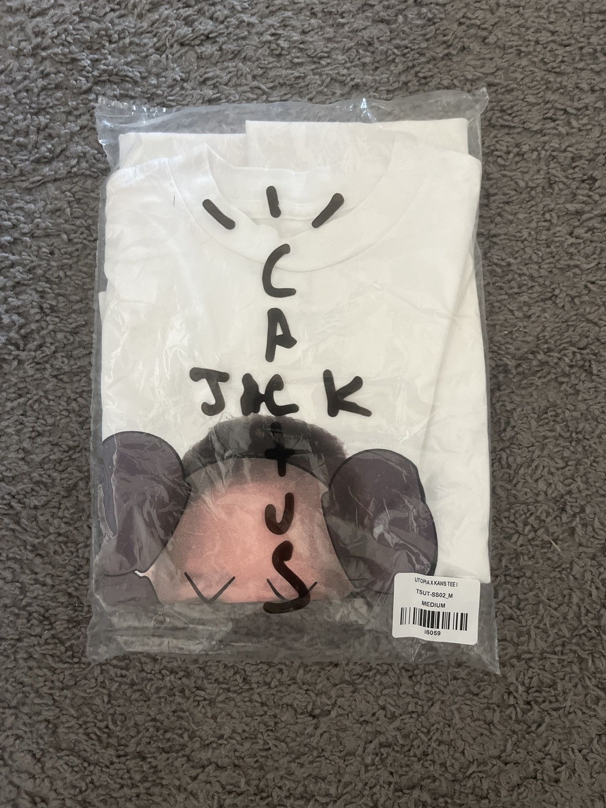 Utopia X Kaws Travis Scott Tee