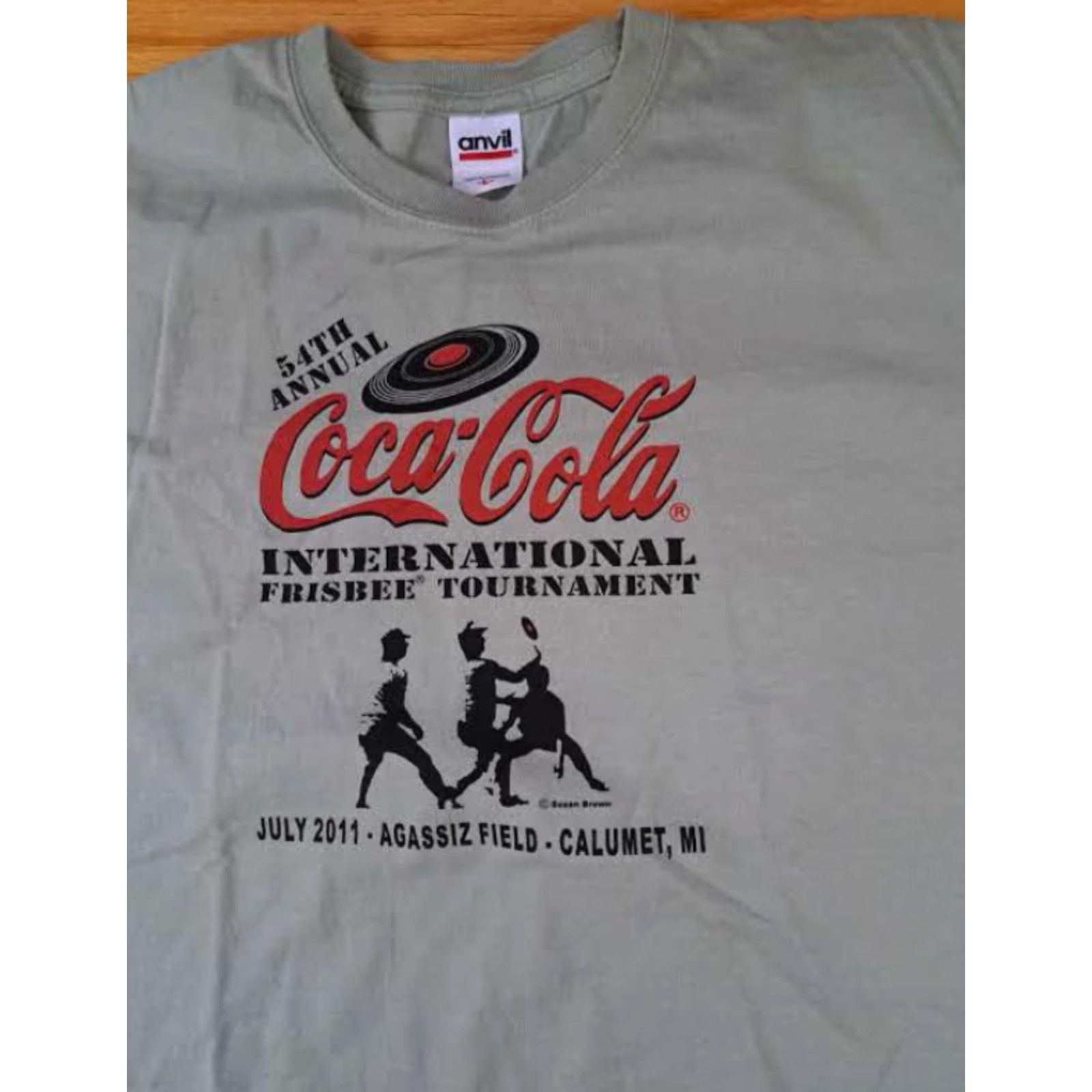 Anvil VINTAGE Coca-Cola International Frisbee Tournament 2011 Calumet Mi. LG T-Shirt Apparel Unisex Adults Short Sleeve Tan L Size Mens Womens Boys Girls Size US L / EU 52-54 / 3 - 2 Thumbnail