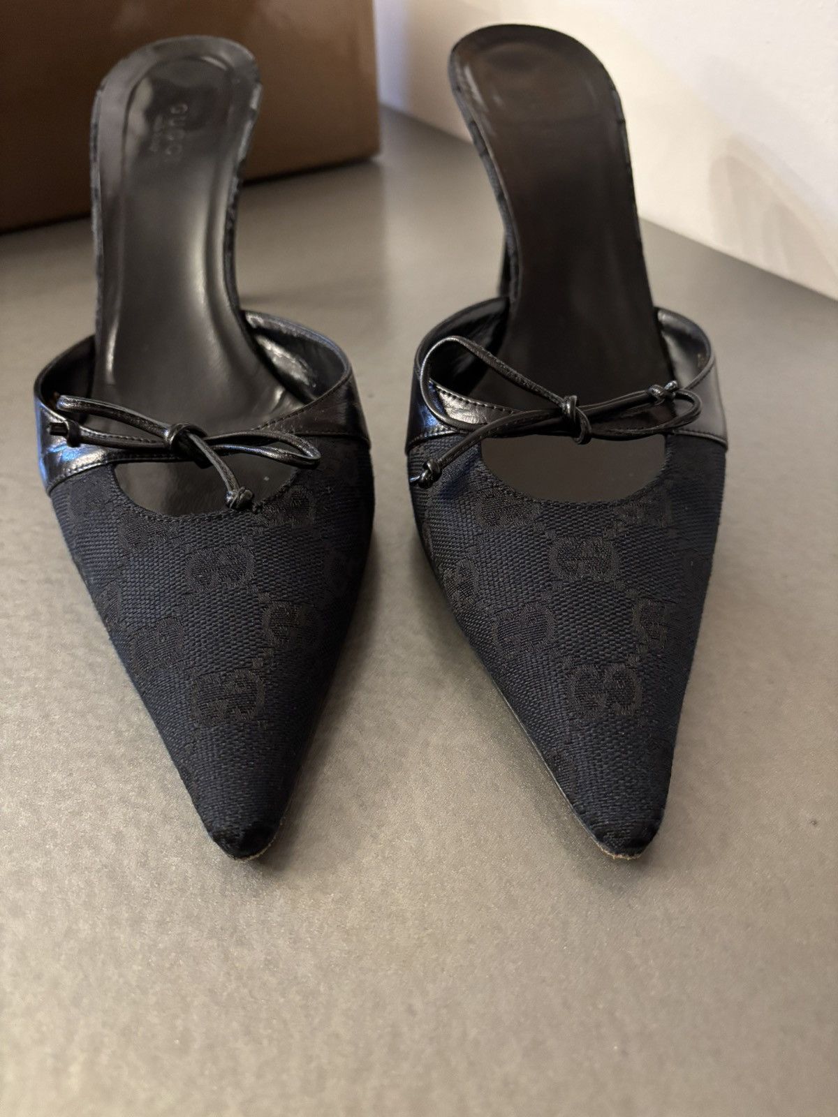 Gucci Black monogram mules grommet accents decorative leather bow Size US 8.5 / IT 38.5 - 11 Thumbnail