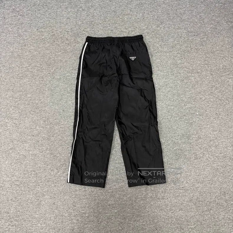 Prada Prada Side stripes, triangle mark, nylon trousers Size 25" / US 0 / IT 36 - 1 Thumbnail