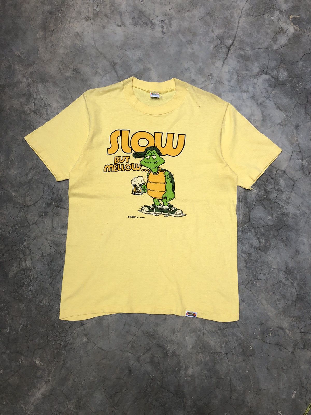 image of Crazy Shirts x Made In USA Vintage 70's Crazy Shirt Slow But Mellow T Shirt in Yellow (Size Medium)