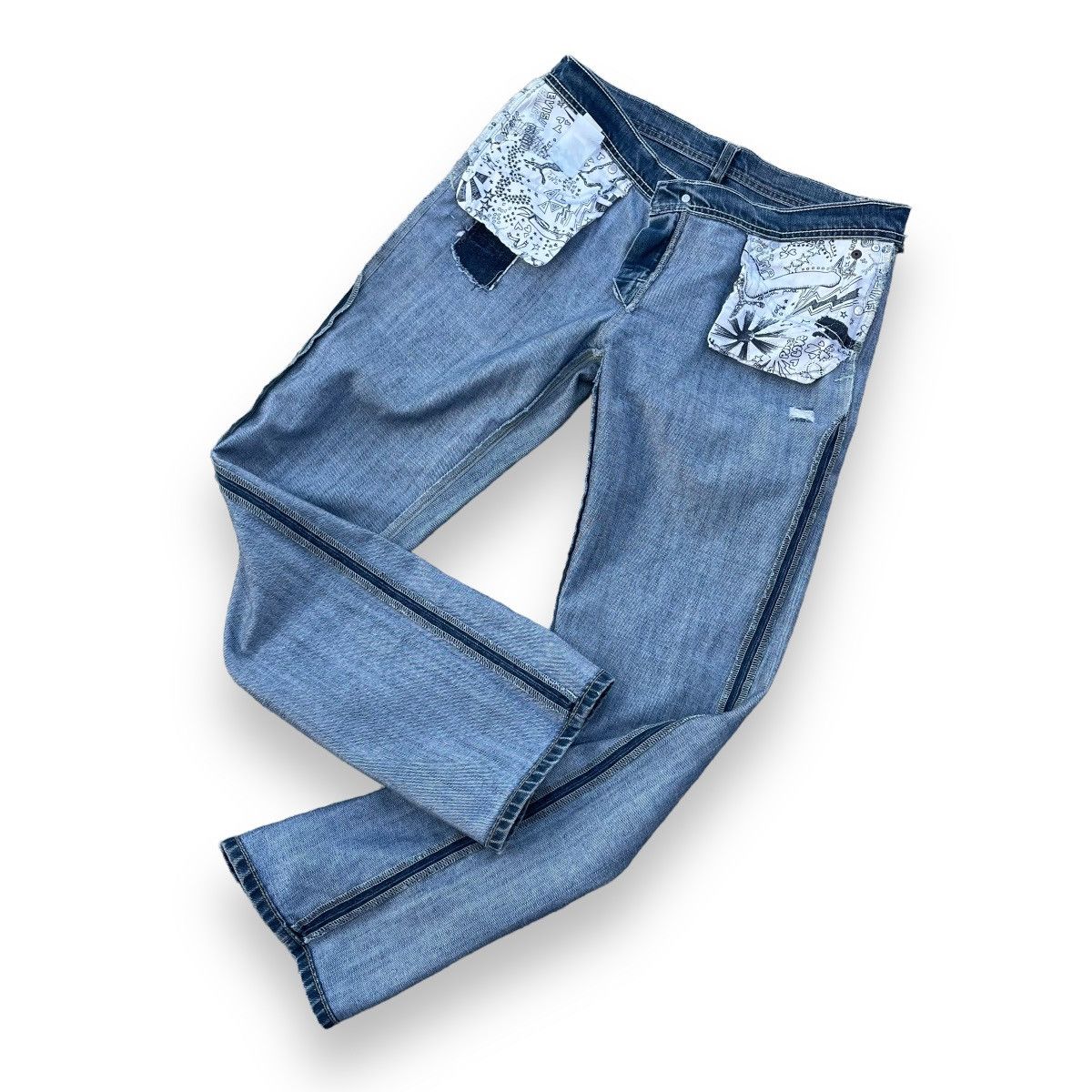 VINTAGE Y2K EVISU X PUMA DISTRESSED WASHED DENIM PANTS