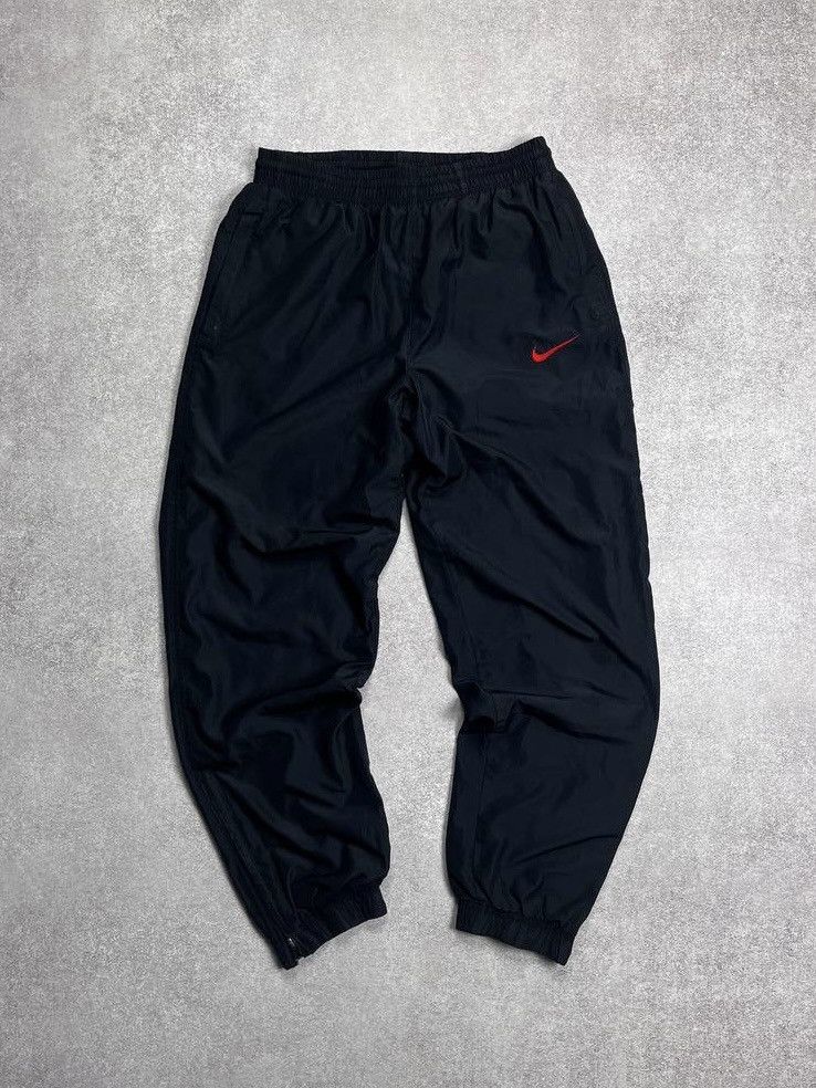 Nike VINTAGE NIKE SWOOSH BAGGY NYLON TRACK PANTS Y2K WINDRUNNER S Size US 31 - 1 Thumbnail