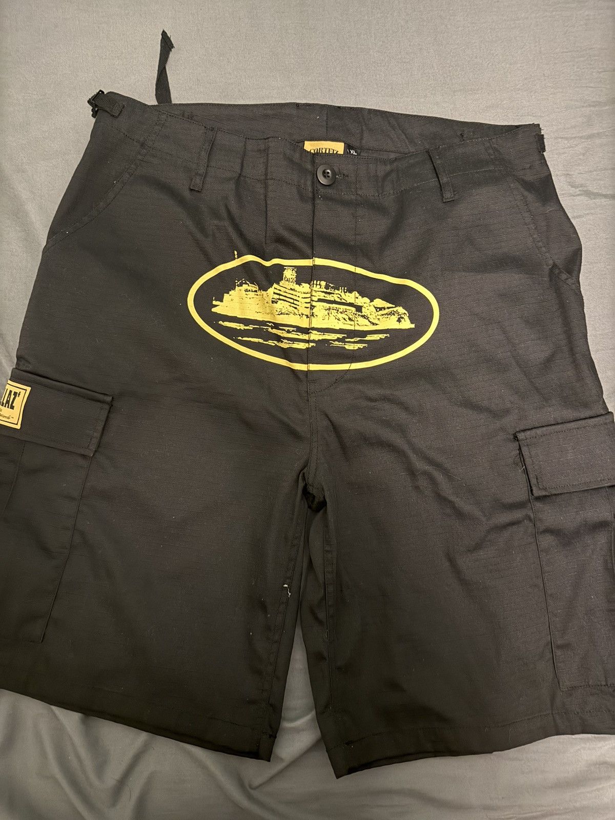 Corteiz Black and yellow cortiez shorts | Grailed