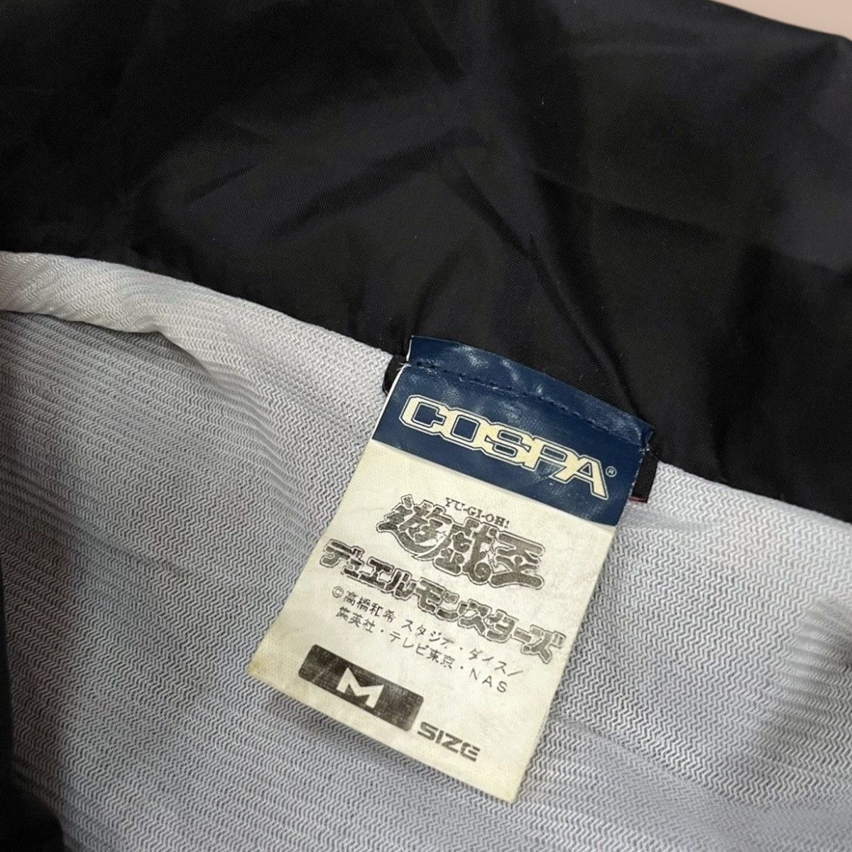 Anime COSPA Yugi-Oh "The Millennium Puzzle" Nylon Jacket Size US M / EU 48-50 / 2 - 9 Thumbnail