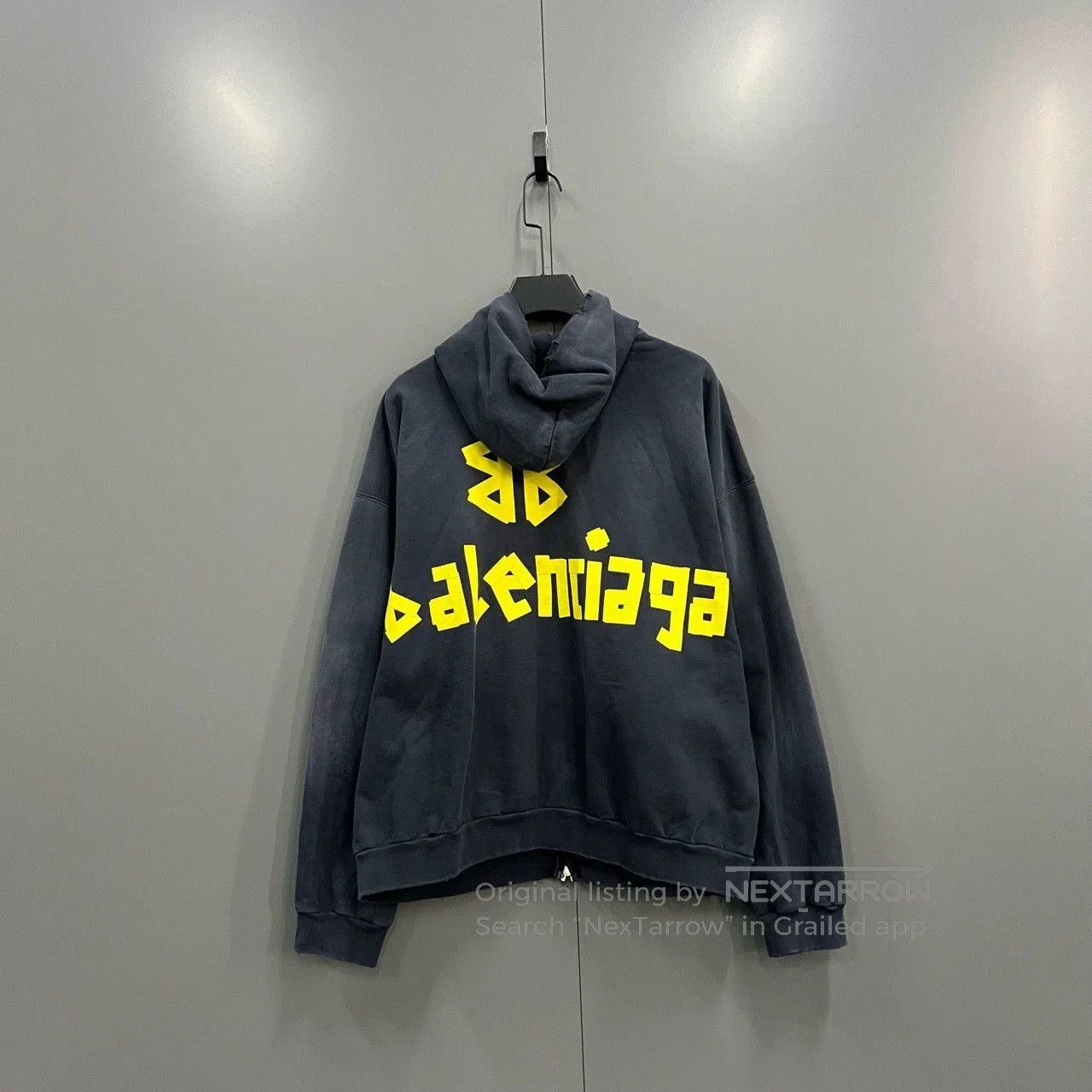 balenciaga yellow logo zip-up hoodie.