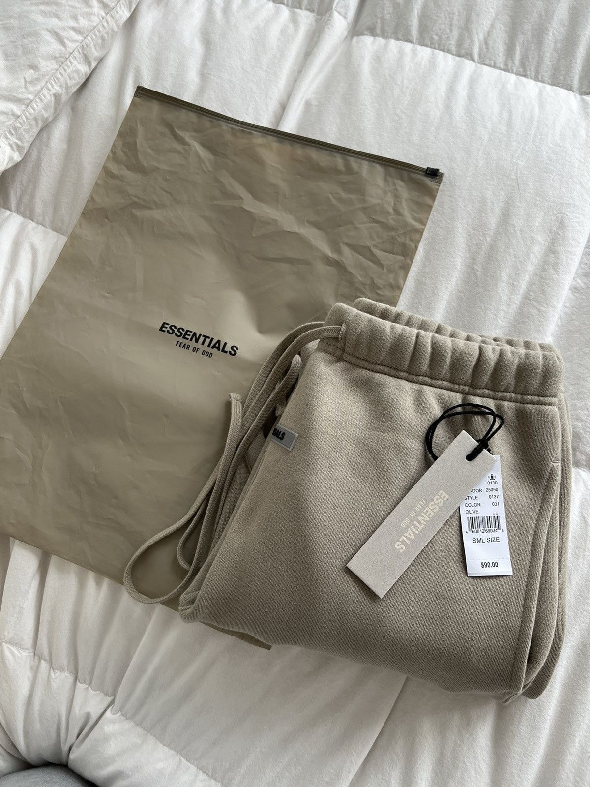 image of Fear Of God Essentials Sweats Olive in Brown, Men's (Size 32)
