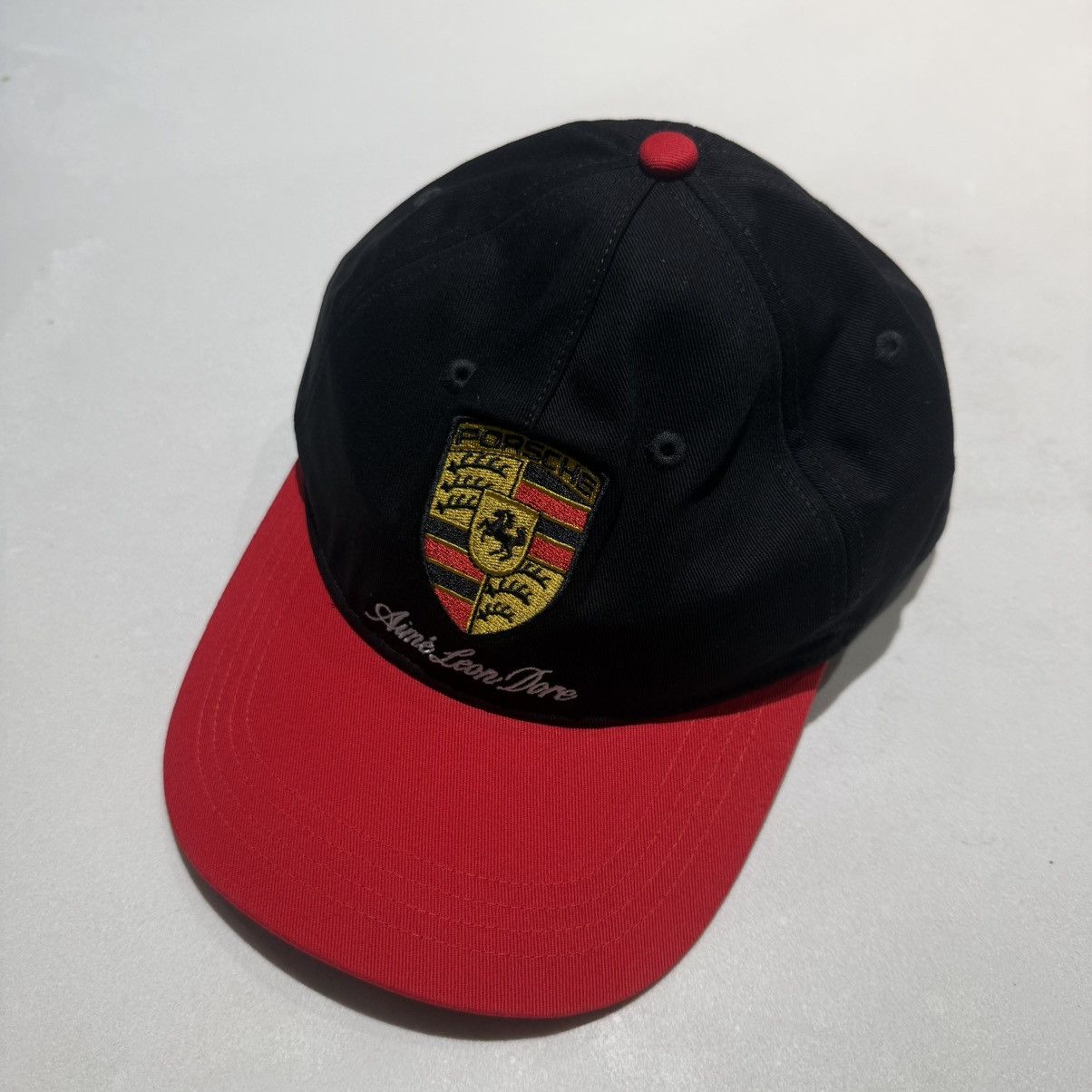 Aime Leon Dore × Porsche Design Aime Leon Dore Black Porsche Script Hat Size ONE SIZE - 1 Thumbnail