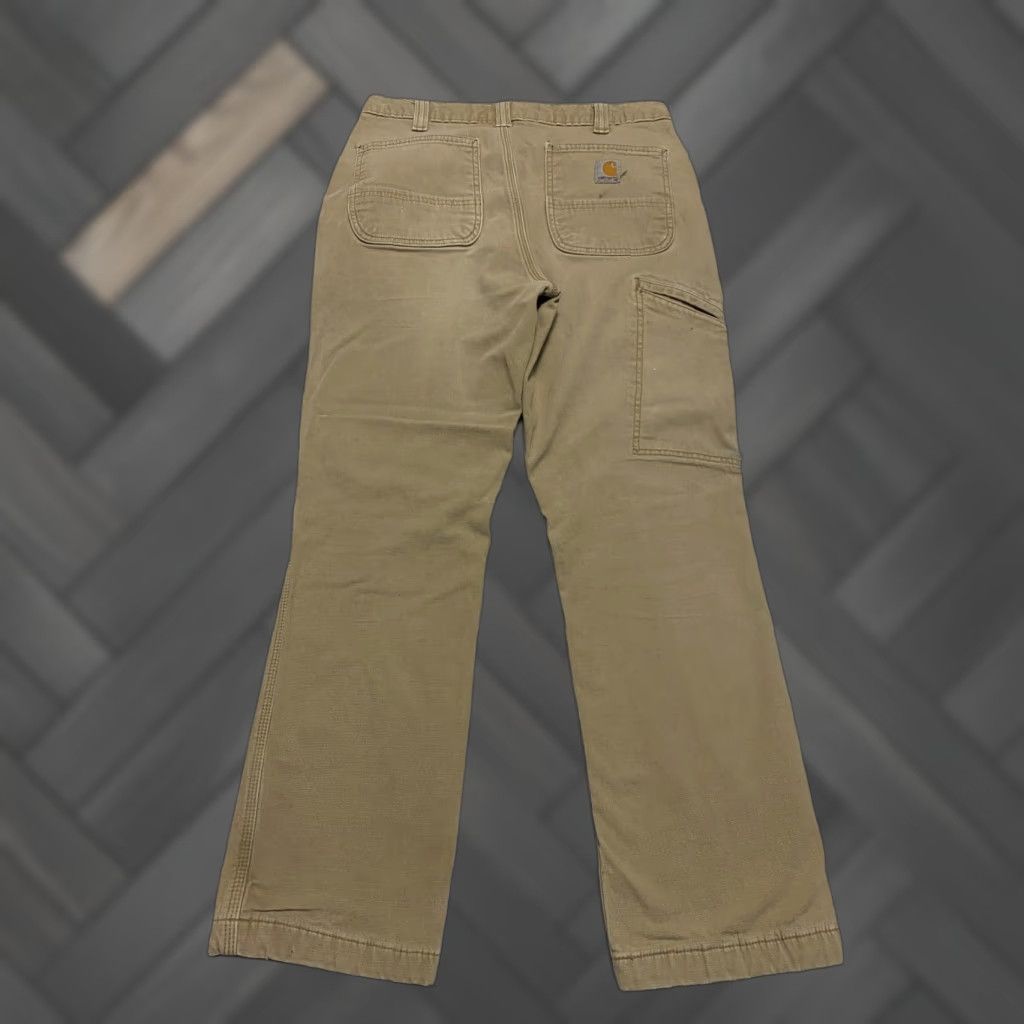 Carhartt Carhartt Relaxed Fit Lined Carpenter Pants Mens 32x28 Khaki Distressed Rip, Utility Pockets, 5-Pocket Design, Canvas Workwear Pants Size US 32 / EU 48 - 1 Thumbnail