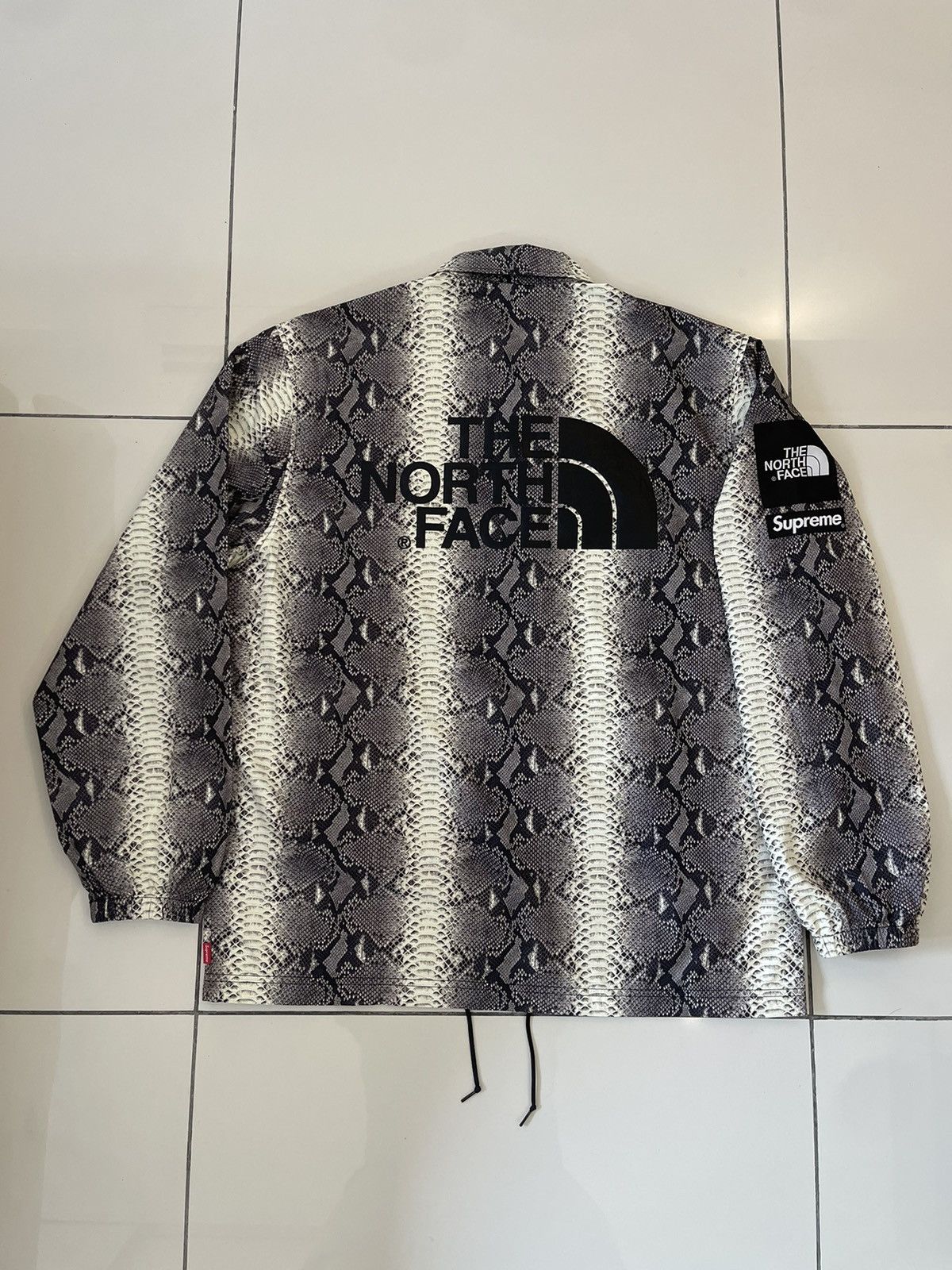 North face x supreme snakeskin hotsell