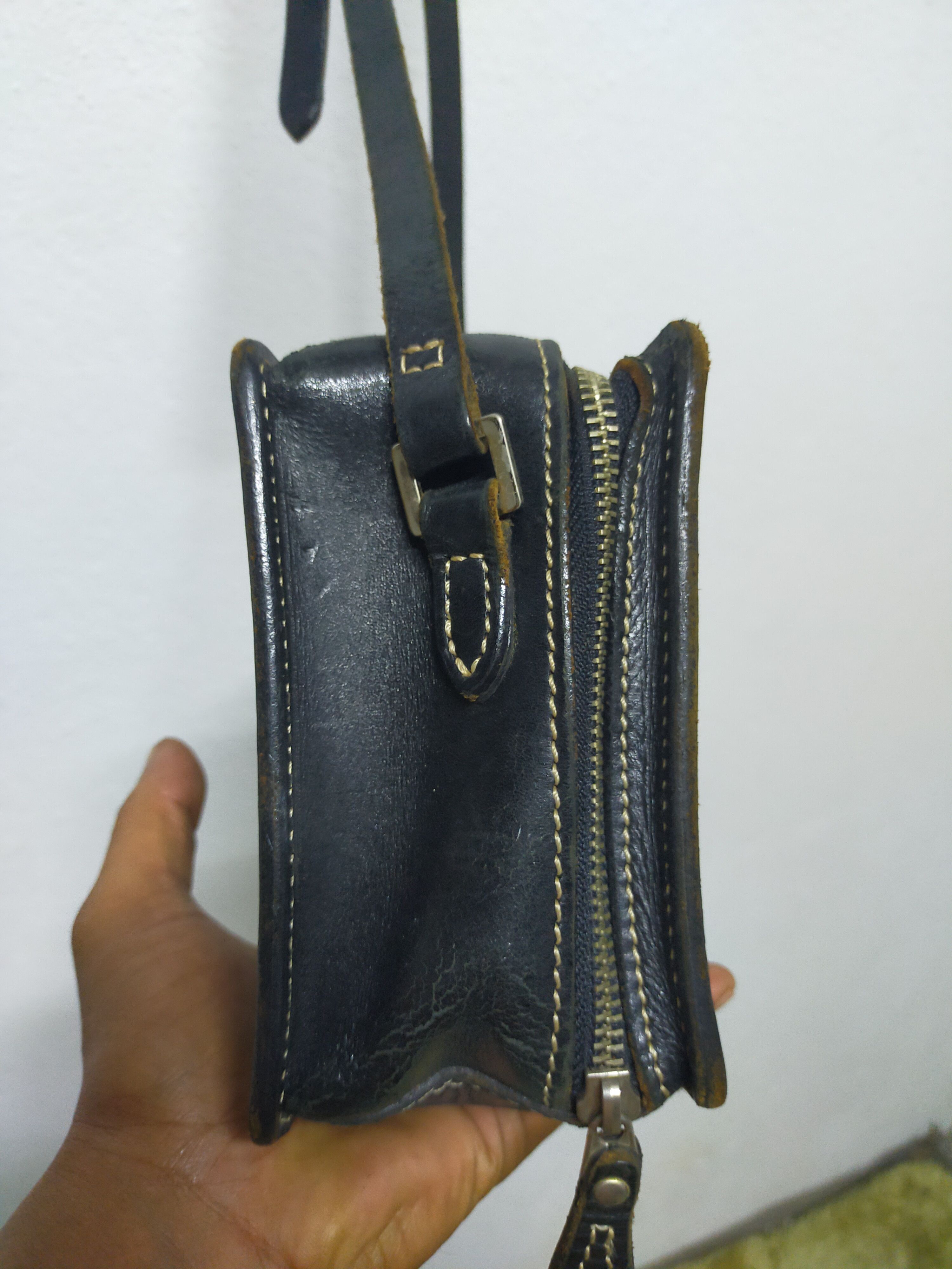 Vintage Courreges leather sling bags