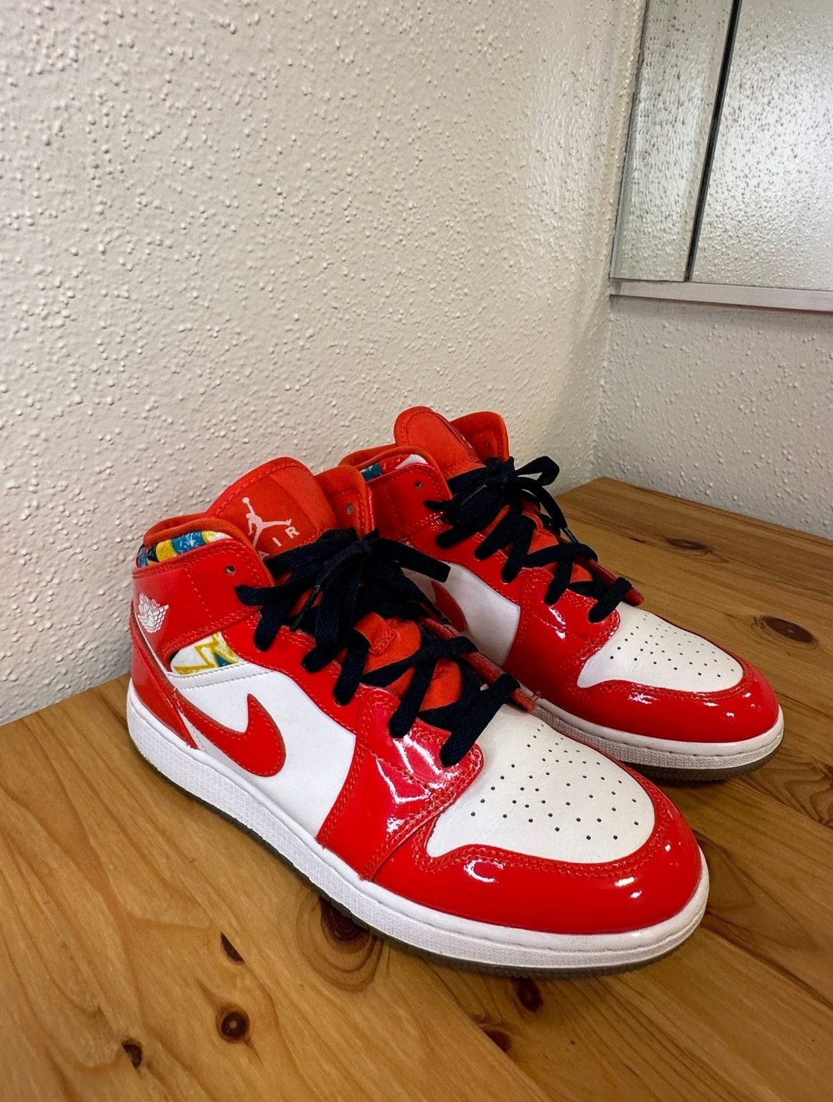 image of Nike Air Jordan 1 Mid Geometric Print Shoes in Red, Women's (Size 8.5)