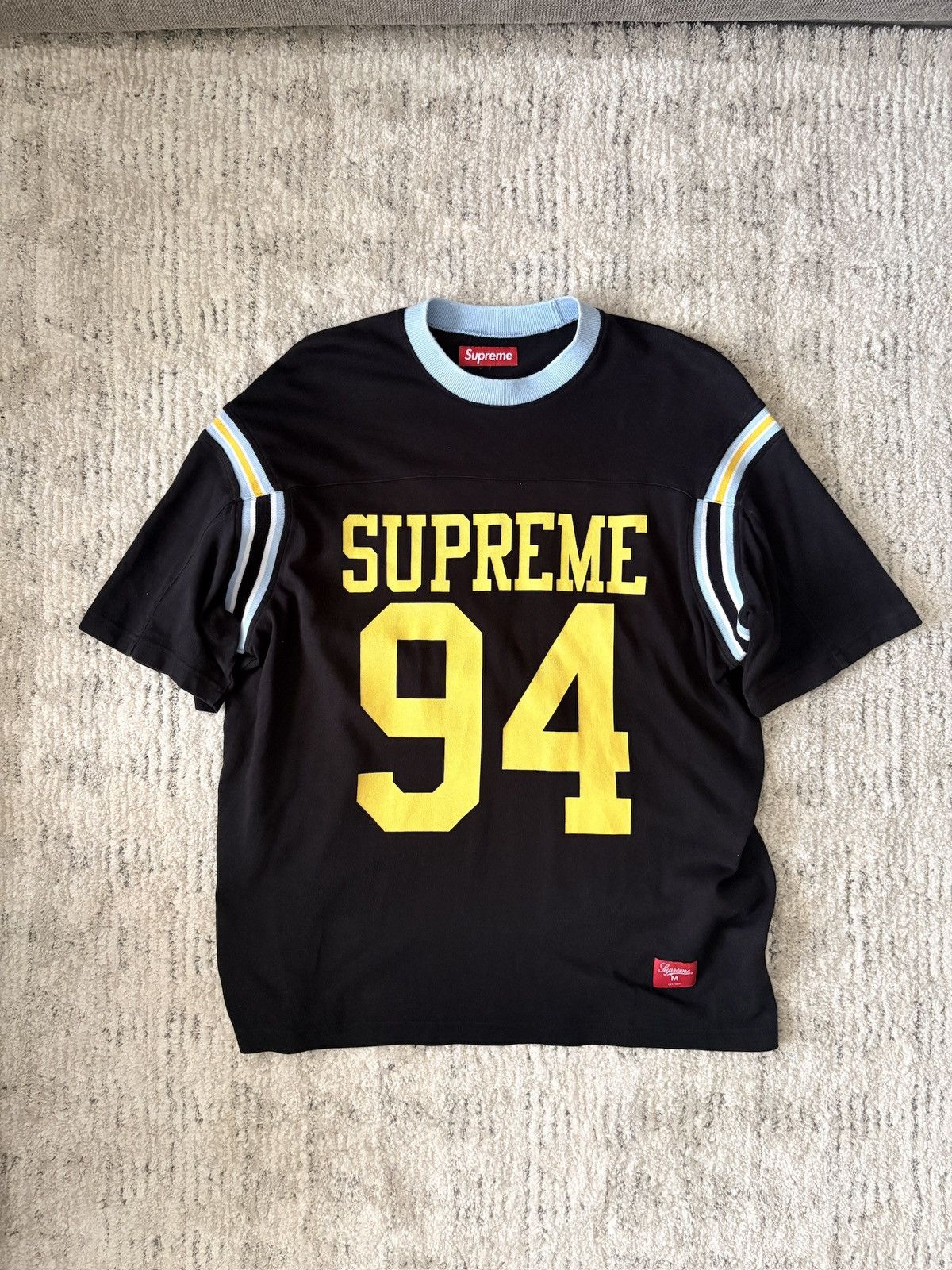 Supreme Supreme Split S/S Football Top Black | Grailed