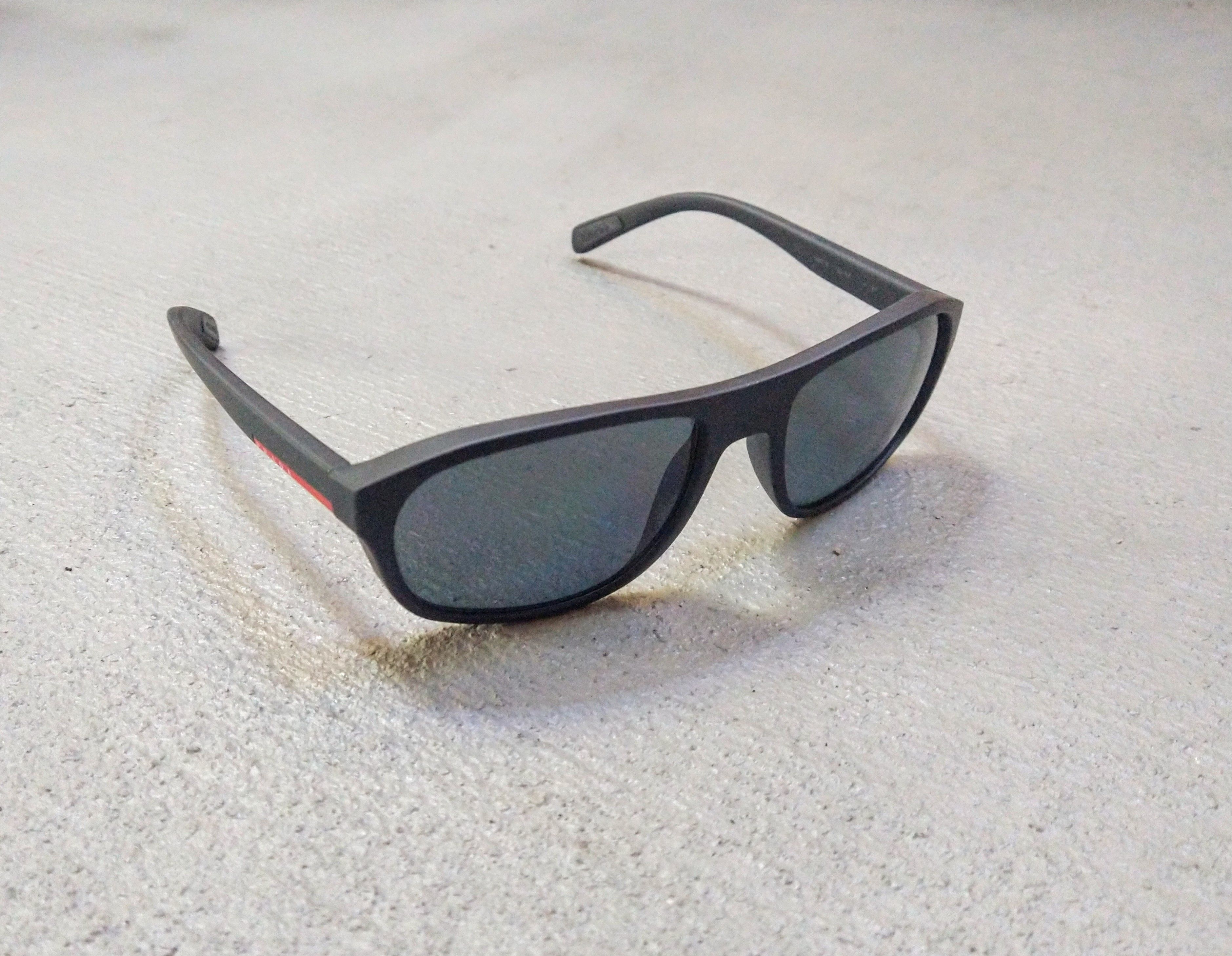 image of Prada Sunglasses Sps 01R Black Blue Lens Linea Rossa in Black/Red, Men's