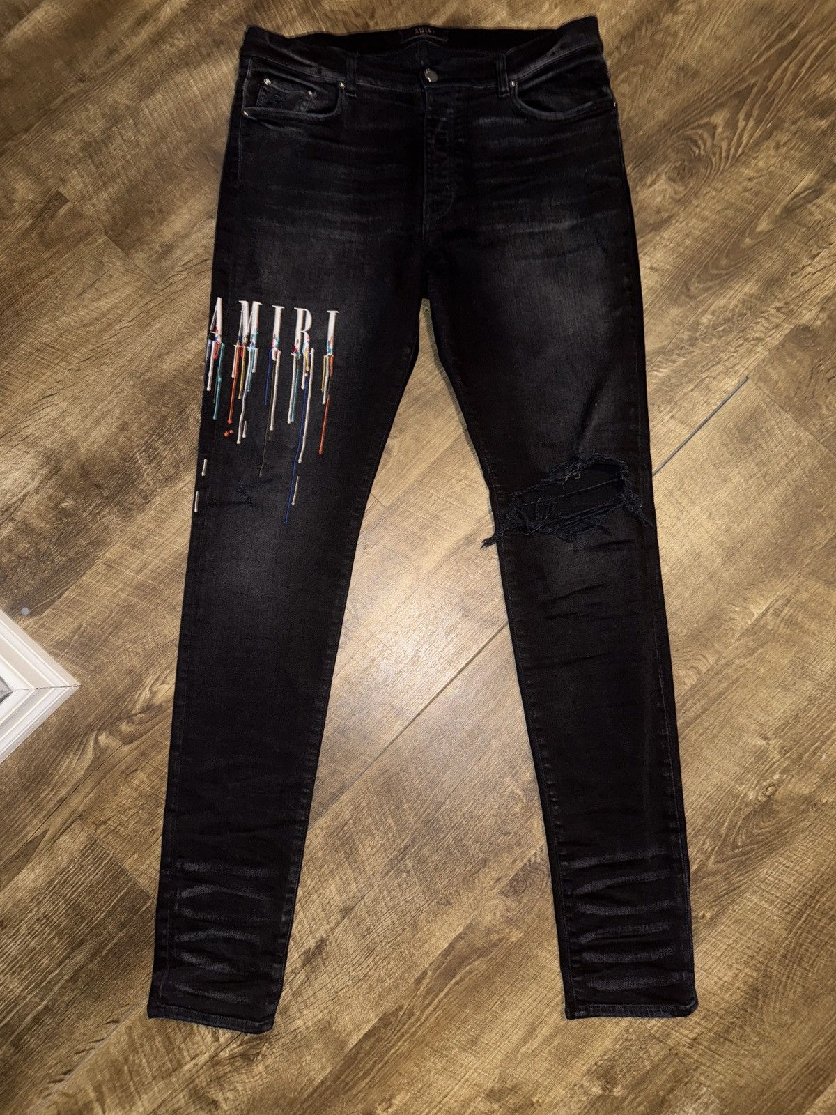 Amiri Paint Drip Logo jean ‘Aged Black’