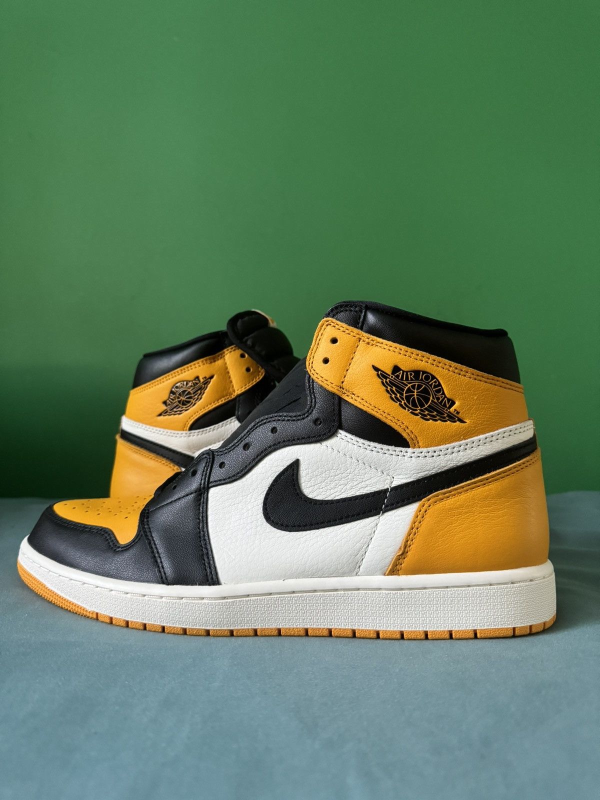 image of Nike Air Jordan 1 High Taxi 2022 Shoes in Orange, Men's (Size 13)