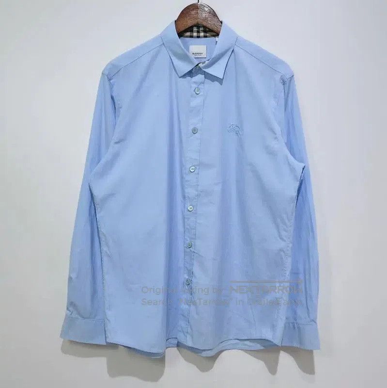 Burberry Burberry Light Blue Polyester Women's Shirt. Size XL / US 12-14 / IT 48-50 - 1 Thumbnail