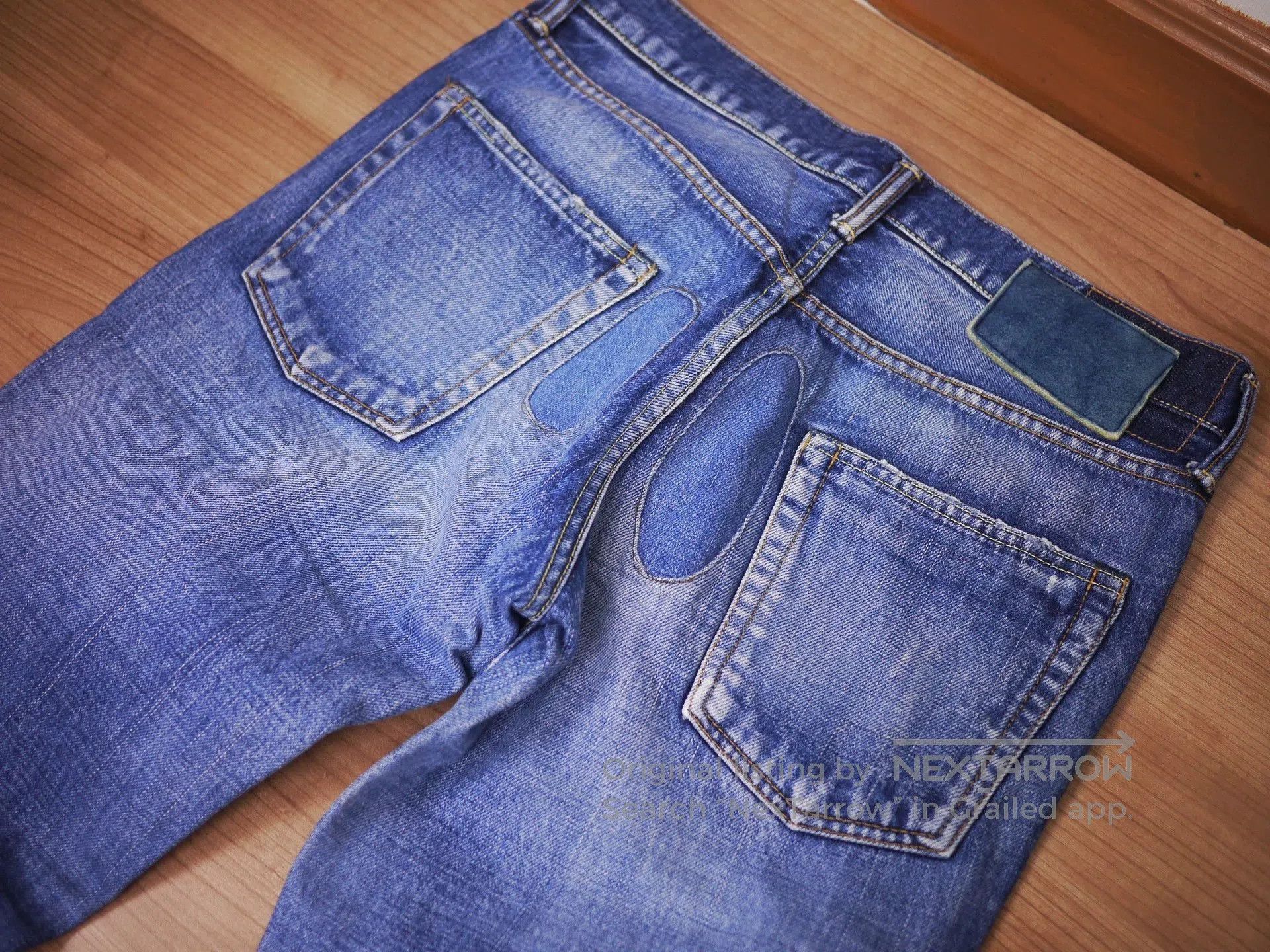 Blue Denim Jeans with Distressed Detail - Size 32.