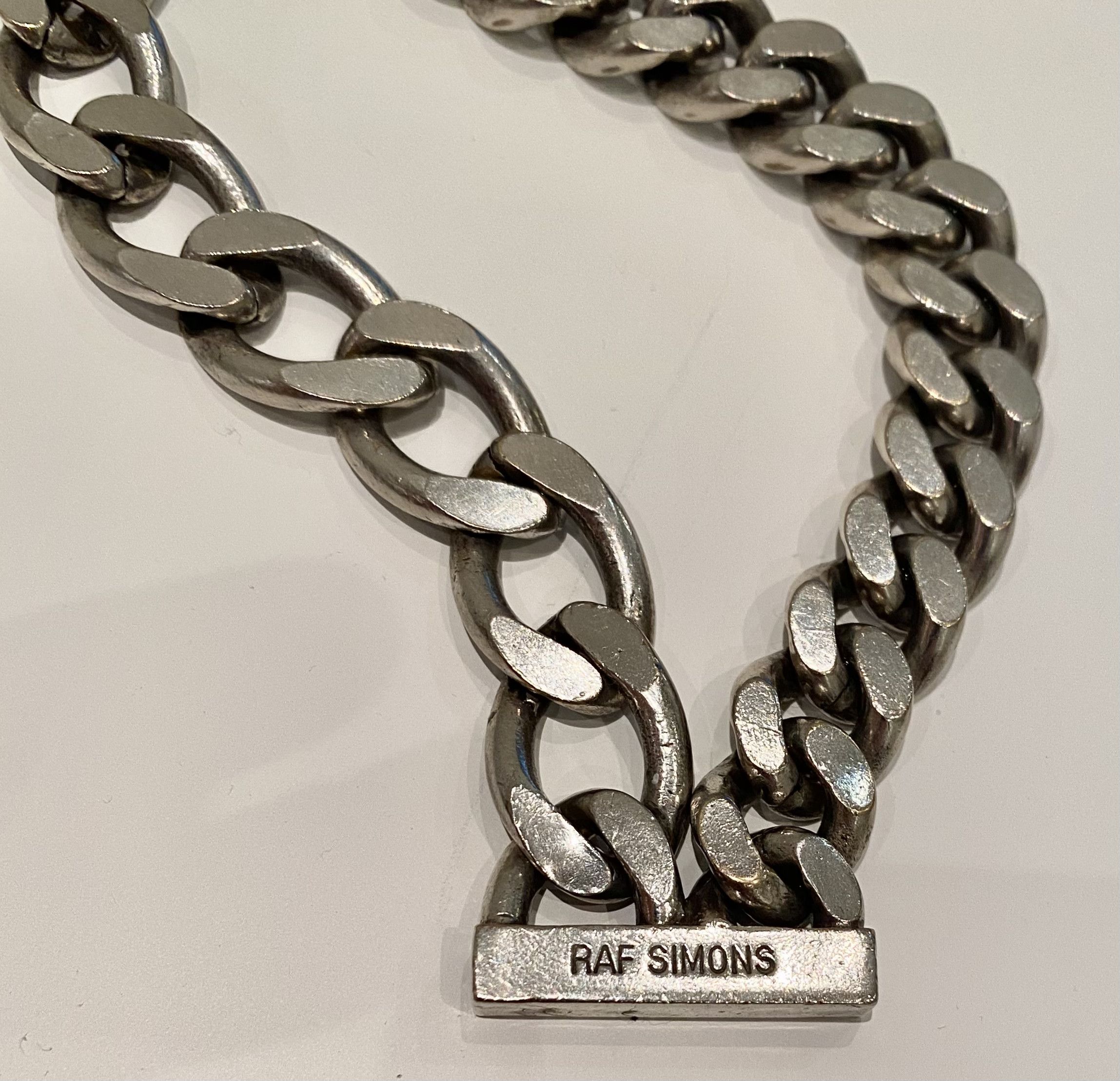 Raf Simons Raf simons wallet chain cherry | Grailed