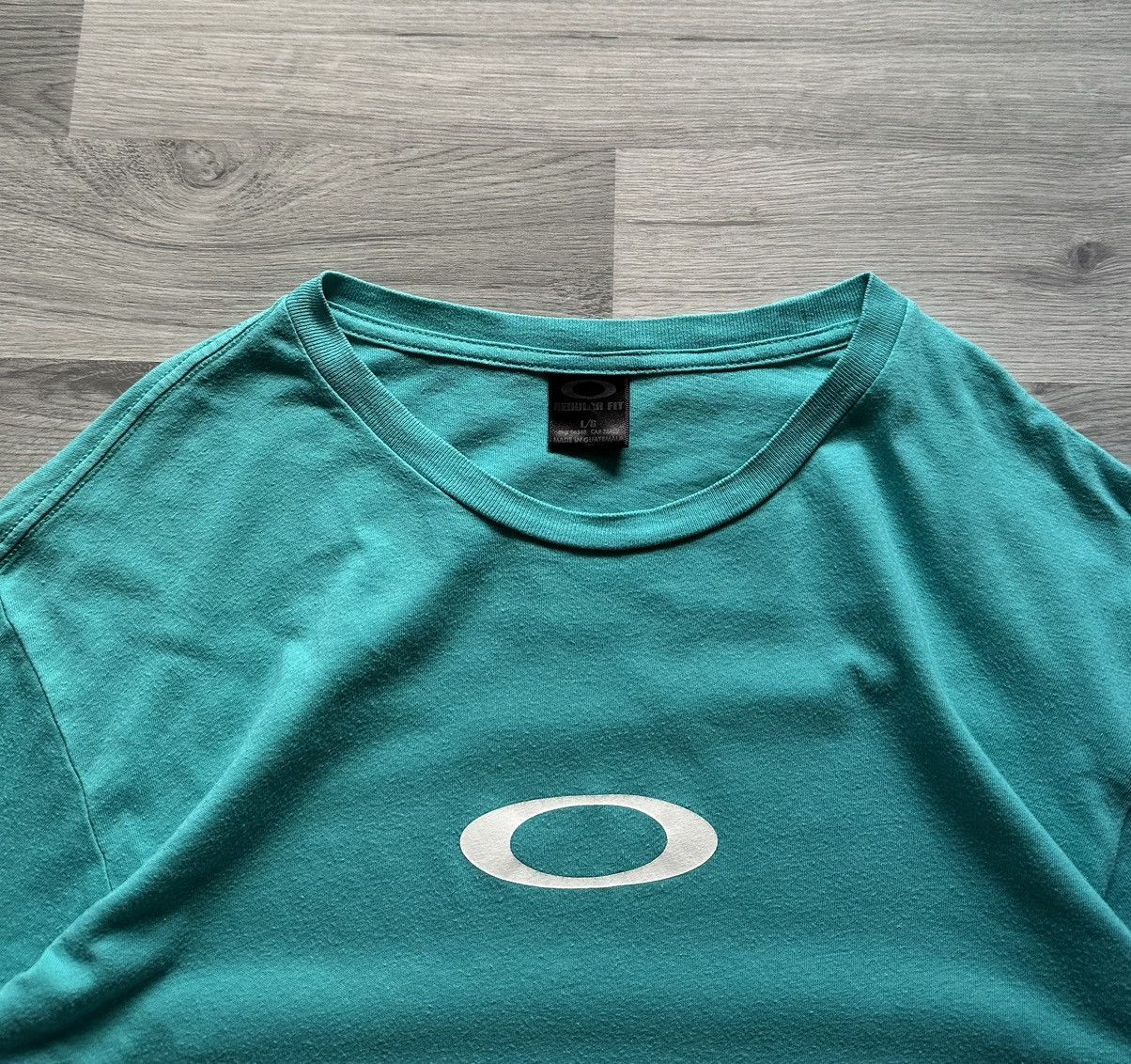 Japanese Brand × Oakley × Vintage Vintage T-shirt Oakley ☠️ regular fit turquoise Size US L / EU 52-54 / 3 - 4 Thumbnail