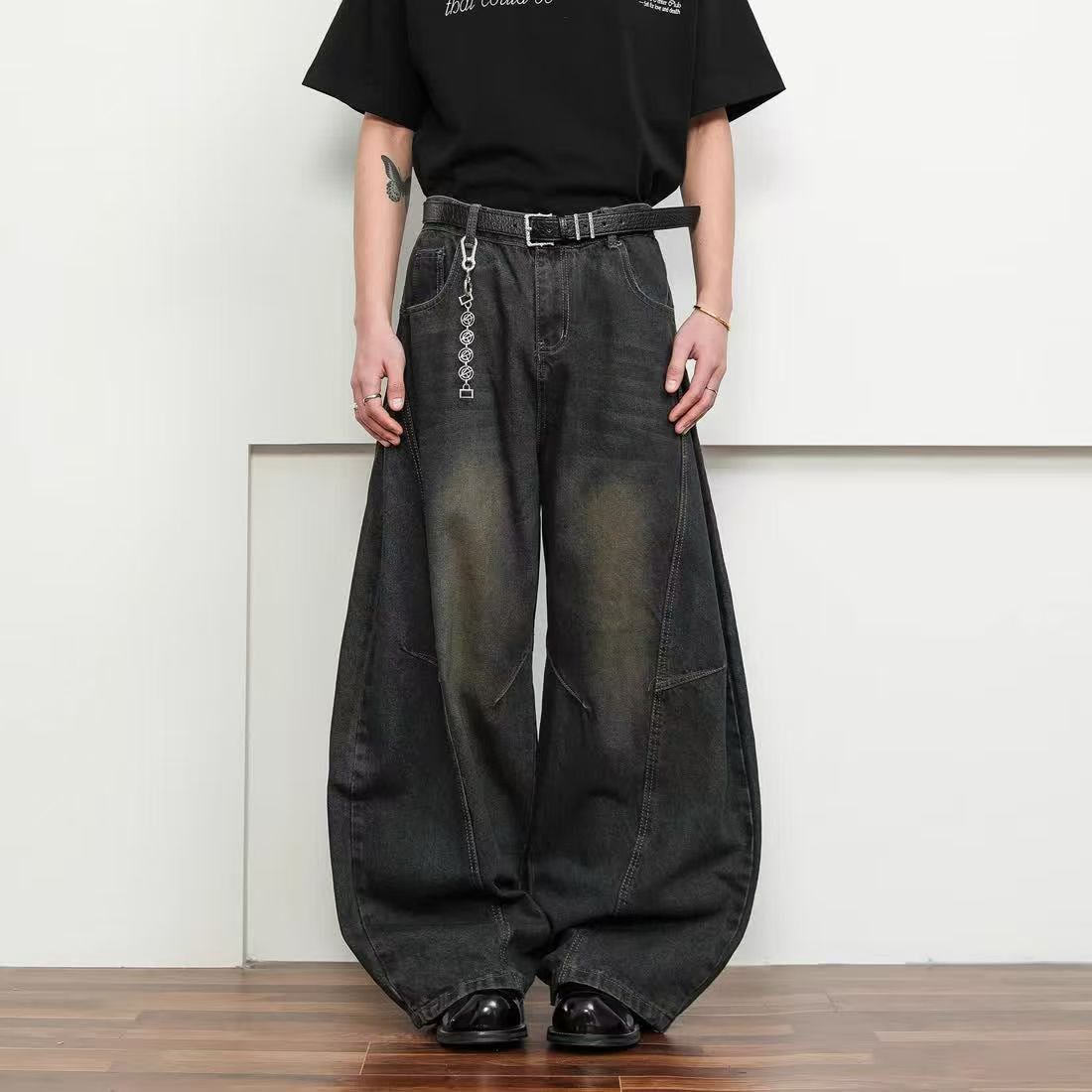 Men's washed vintage distressed patchwork scimitar jeans