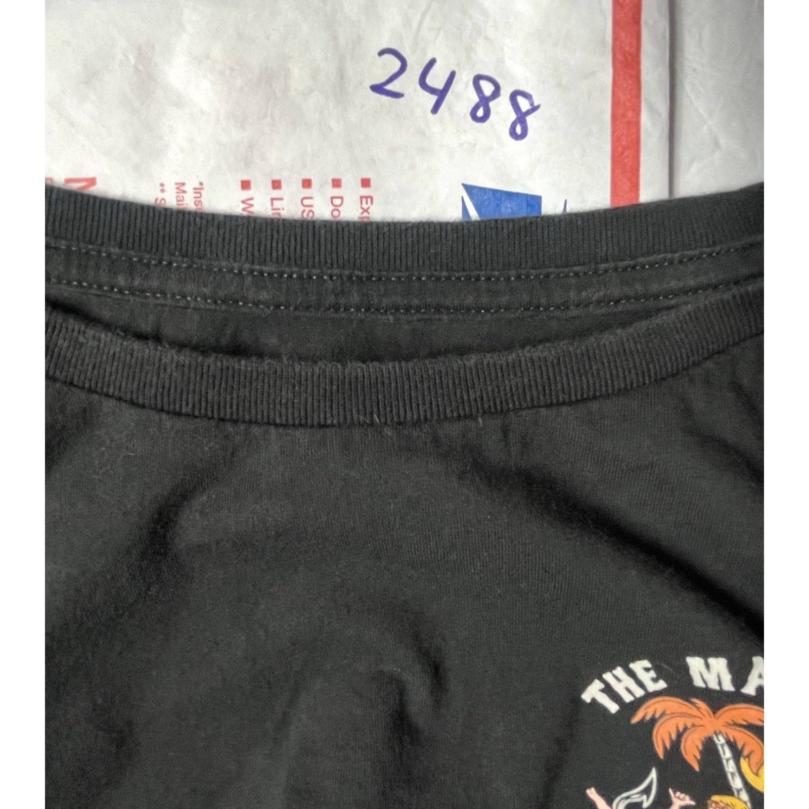 Vintage The Mad Hueys T-Shirt Black Graphic Print What Happens In Paradise Medium Mens Reg Crew Neck Short Sleeve Cotton Graphic Print Size US M / EU 48-50 / 2 - 8 Thumbnail