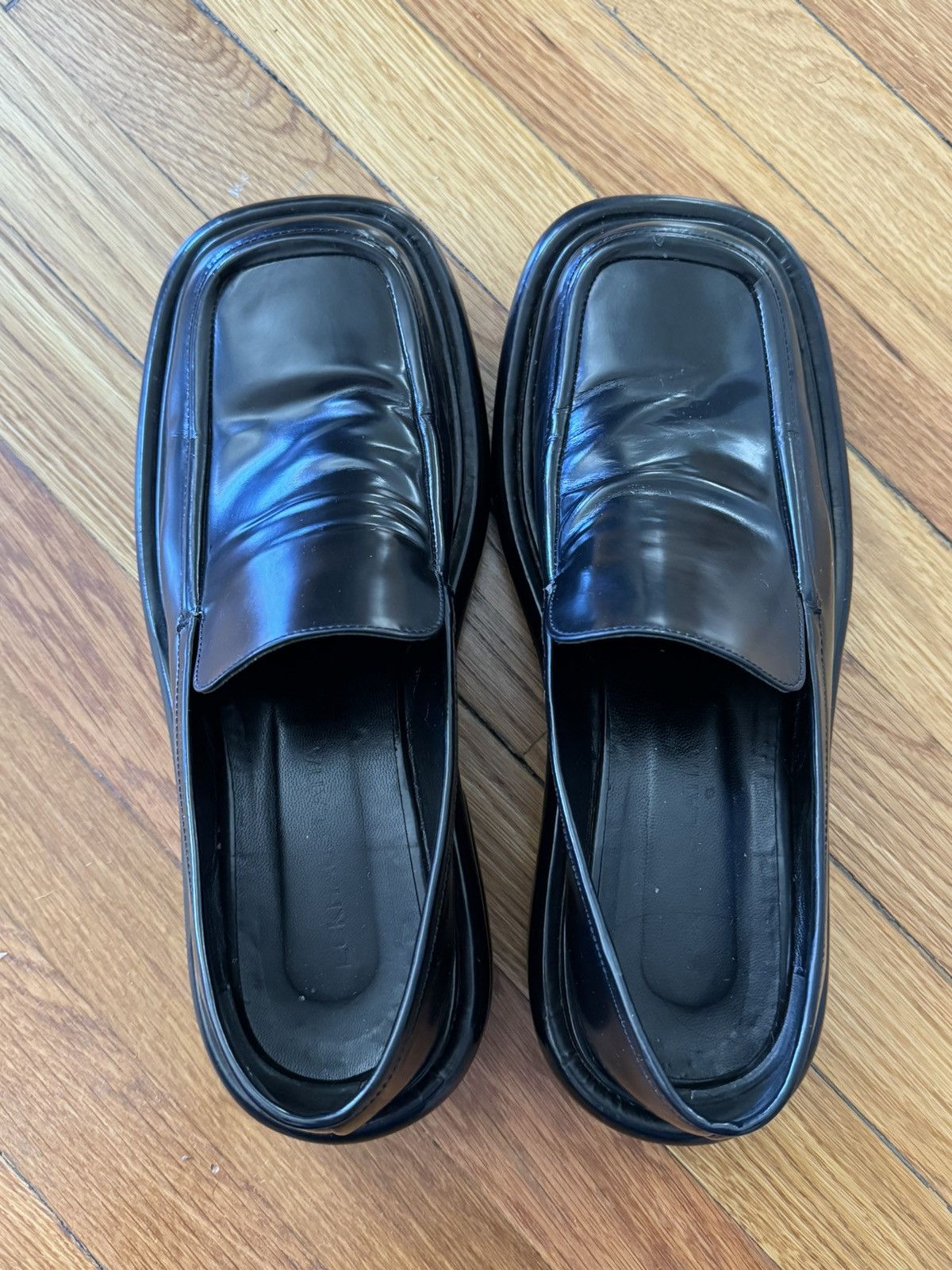 Eckhaus Latta Eckhaus Latta Black Stacked Loafers | Grailed