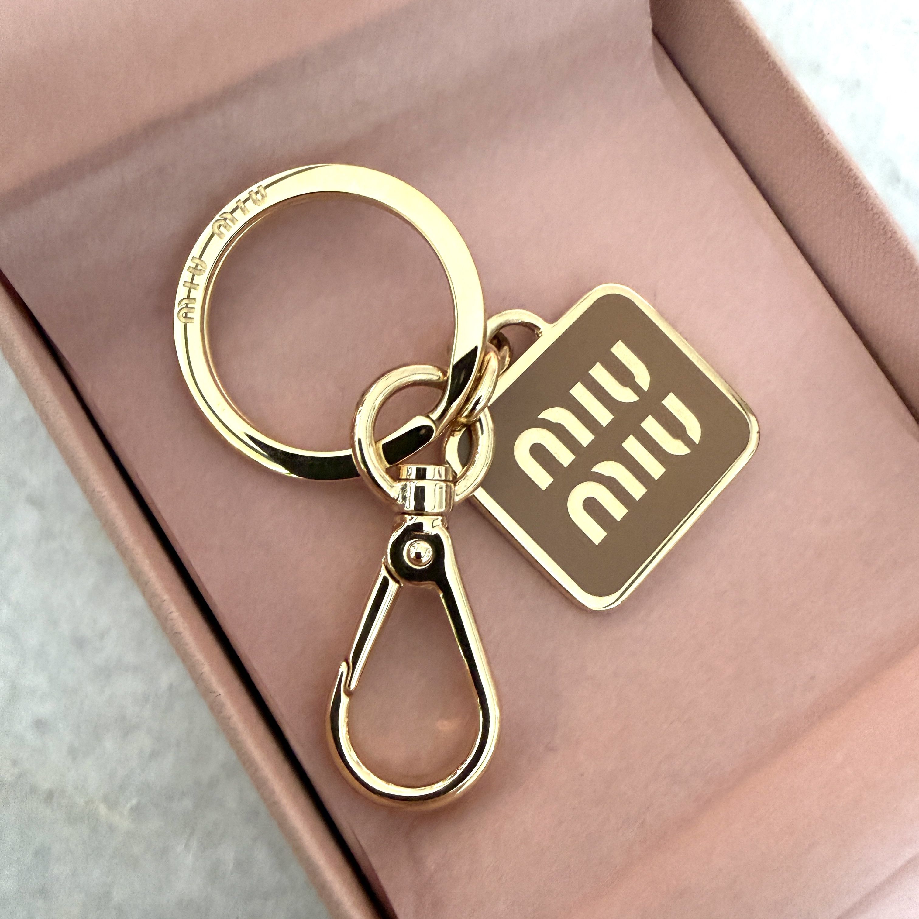 Miu Miu Miu Miu 5PS066 Metal Key Chain Logo, gold and caramel in box Size ONE SIZE - 6 Thumbnail