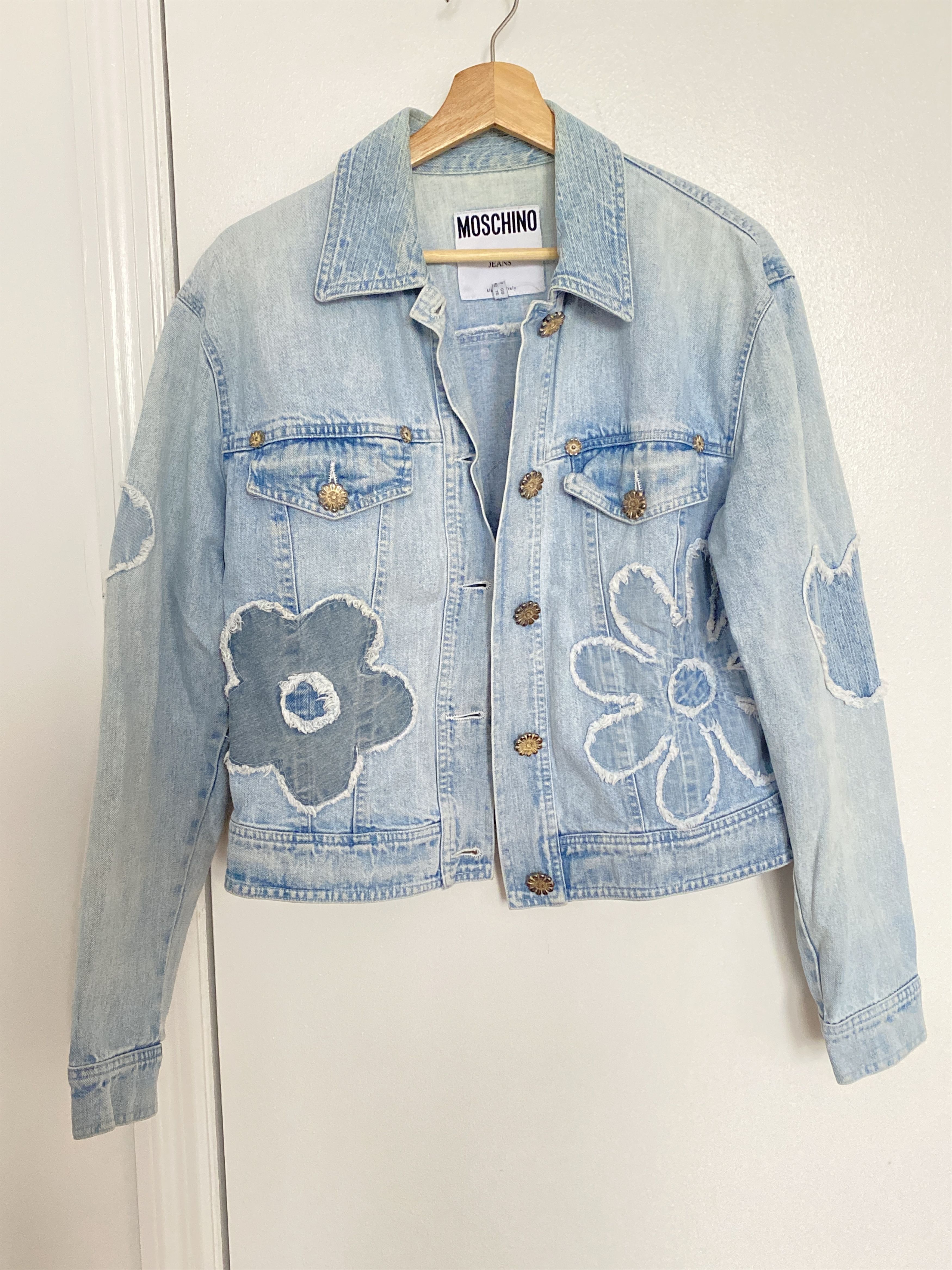 image of Vintage 90's Moschino Denim Jacket in Light Blue, Women's (Size Medium)