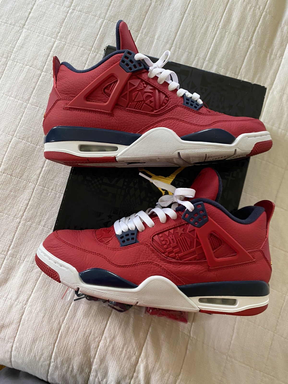 image of Jordan Nike Jordan 4 Retro “Fiba” 11M Shoes in Red, Men's