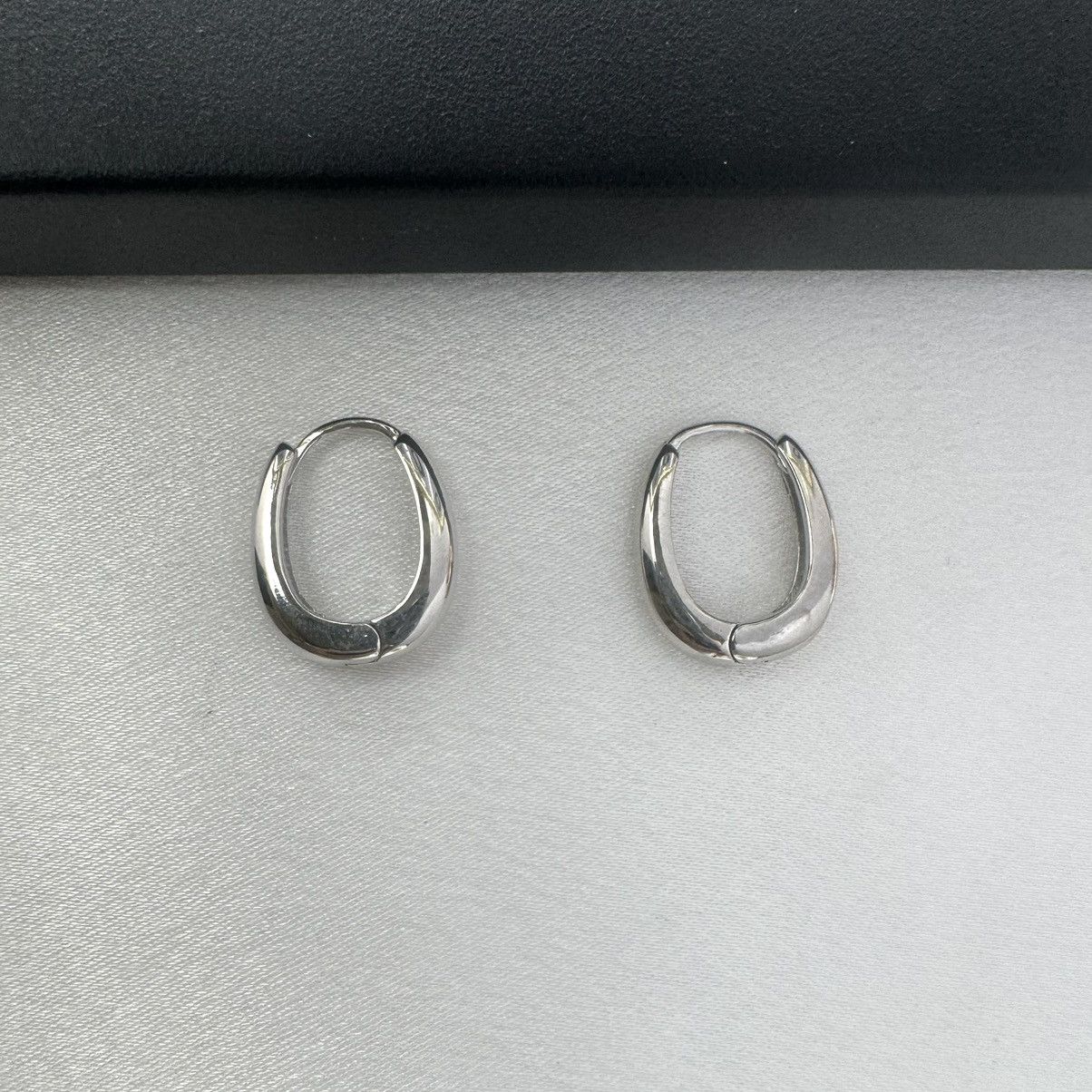 Designer Small Oval Silver Hoop Earrings for Women Size ONE SIZE - 1 Thumbnail