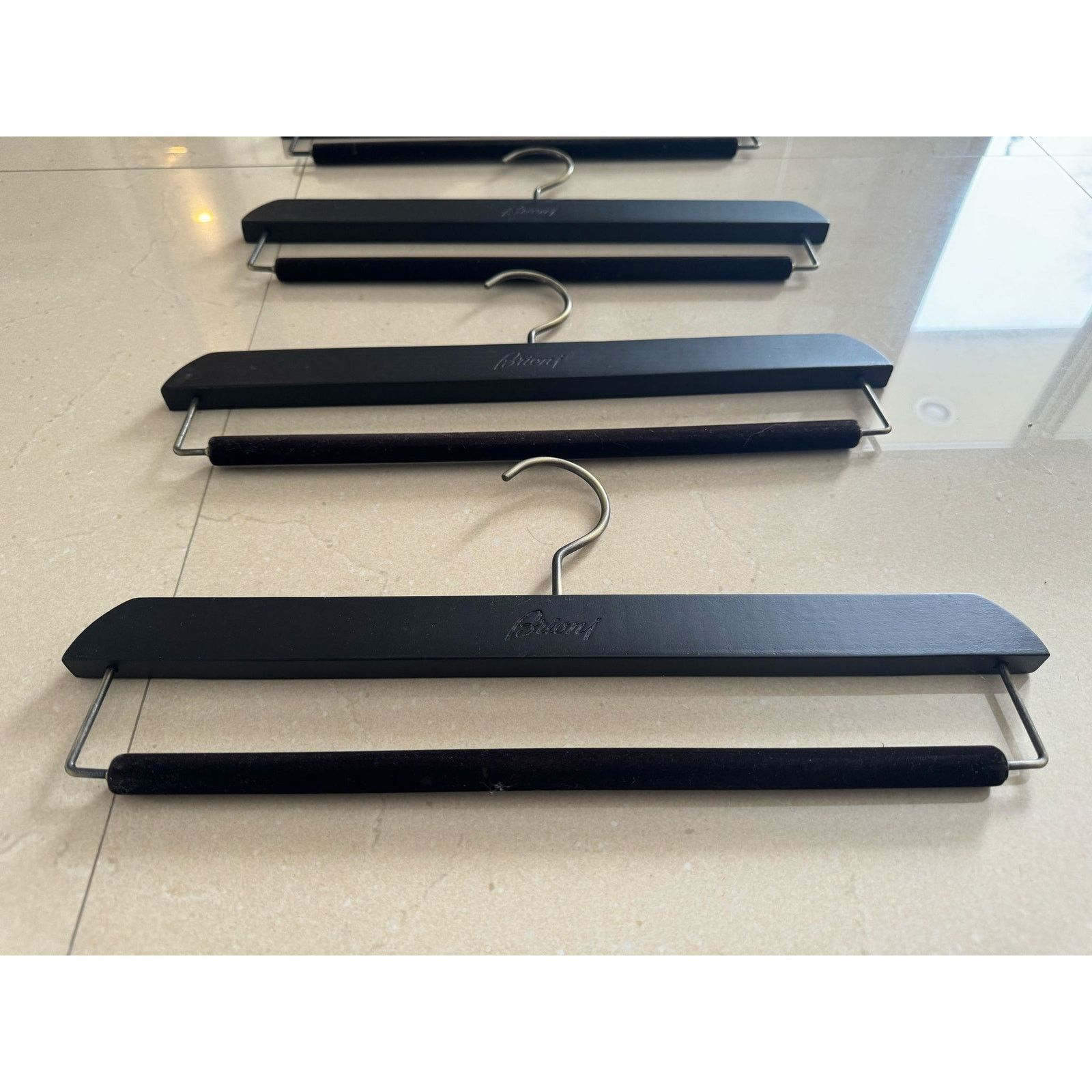 o1rshd1 Size: OS / 8 Brioni Pant Hangers in Black