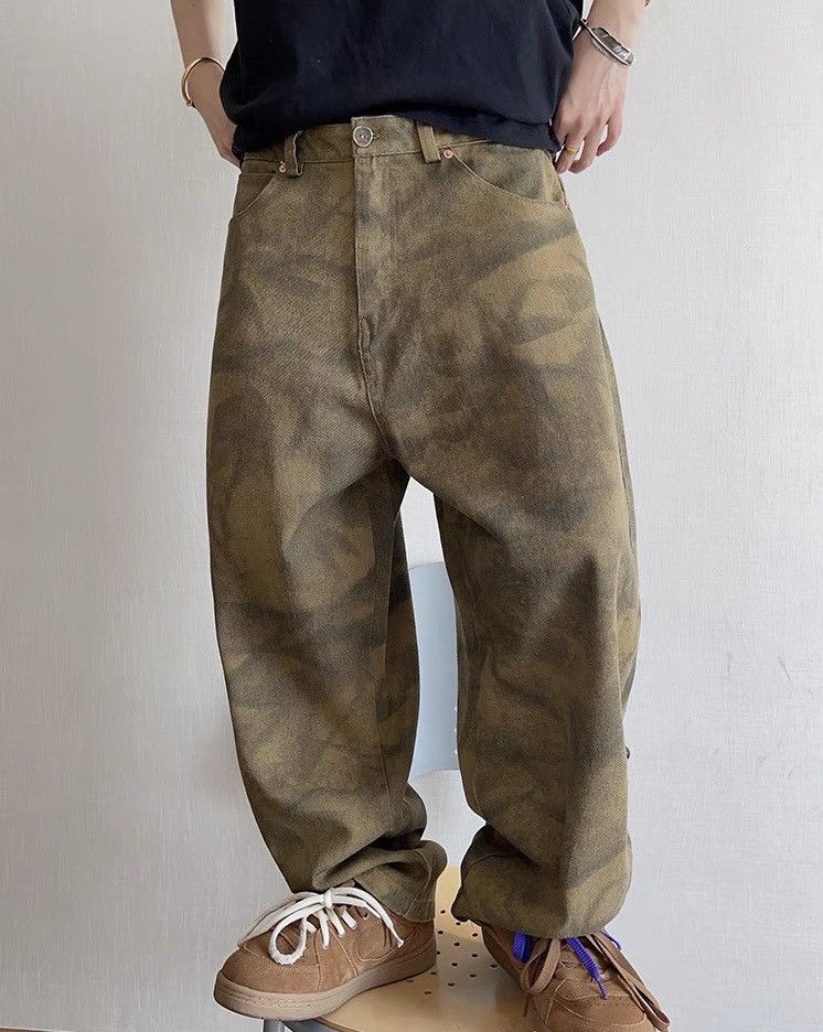 Avant garde tie dye effect faded scimitar baggy pants