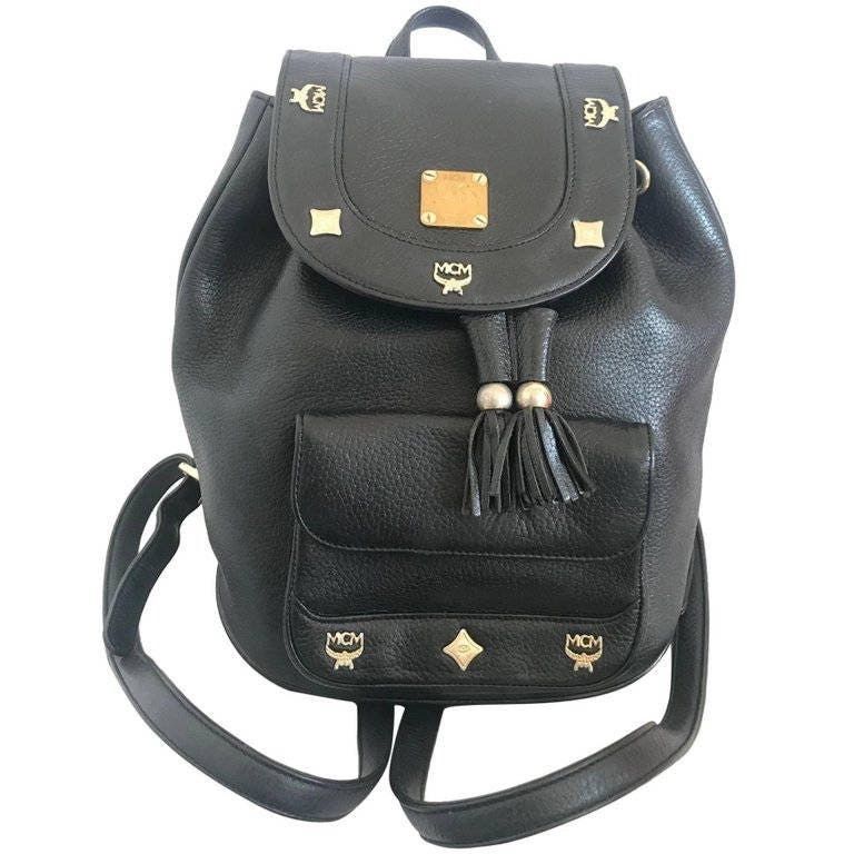 MCM Vintage MCM black backpack with golden studded logo motifs Size ONE SIZE - 1 Thumbnail