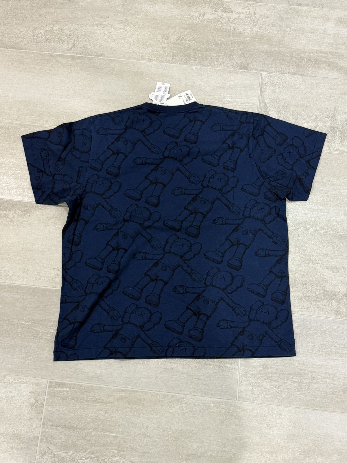 Kaws × Uniqlo Kaws All Over Blue Print Navy T Shirt XXL Size US XXL / EU 58 / 5 - 2 Thumbnail