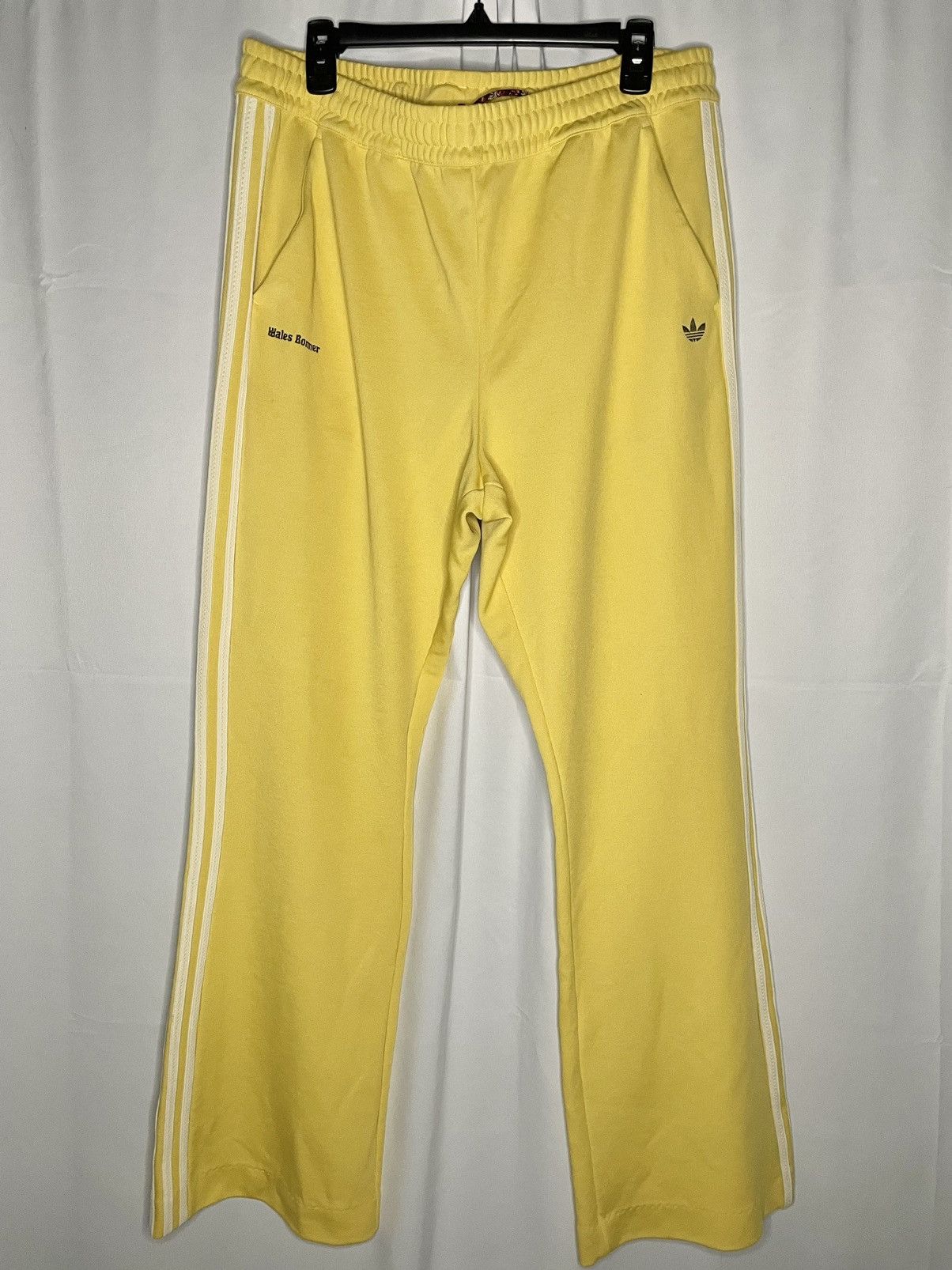 image of Adidas Flared Track Pants in Yellow, Men's (Size 36)