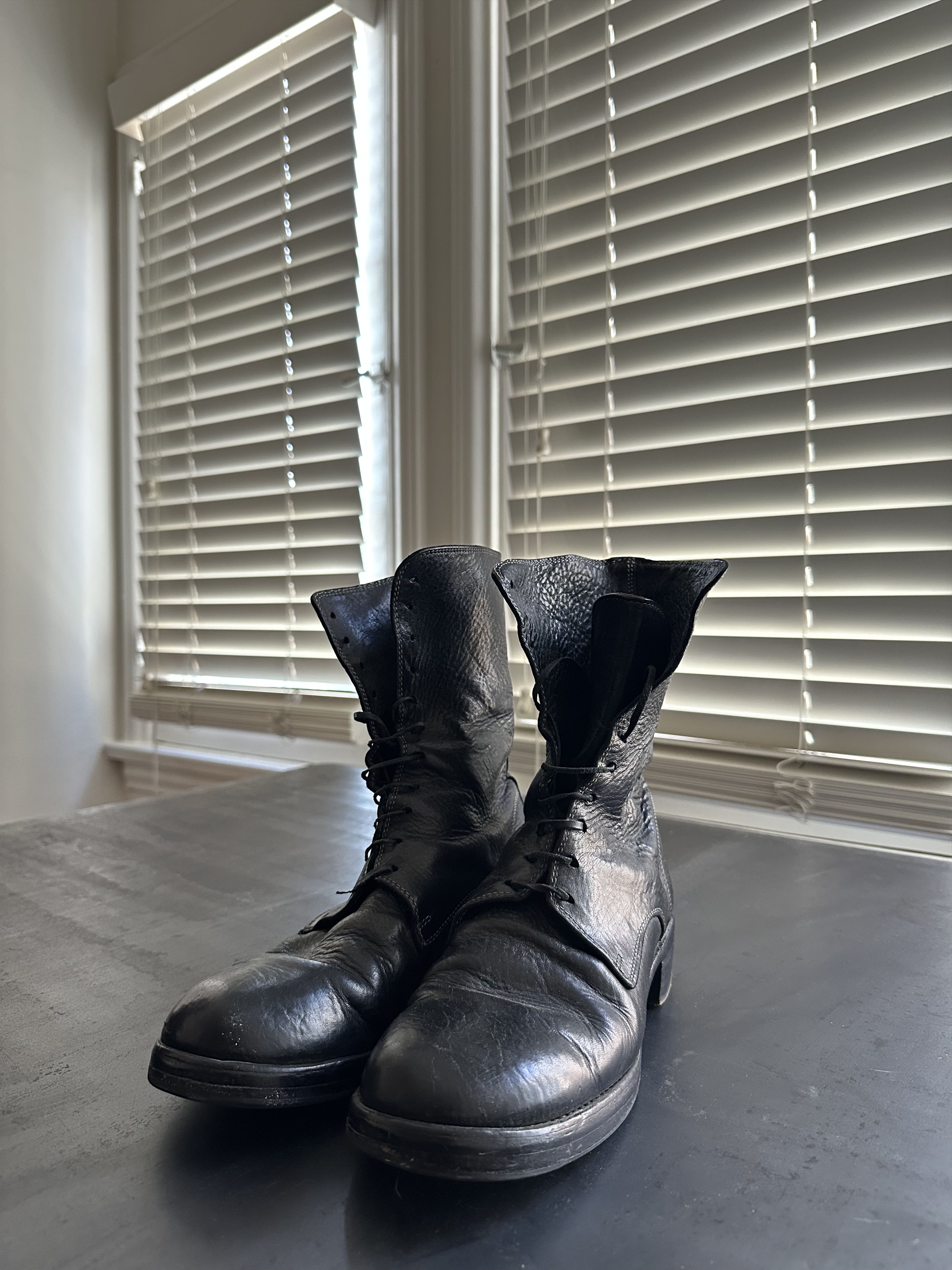 LEATHER LACED UP BOOTS
