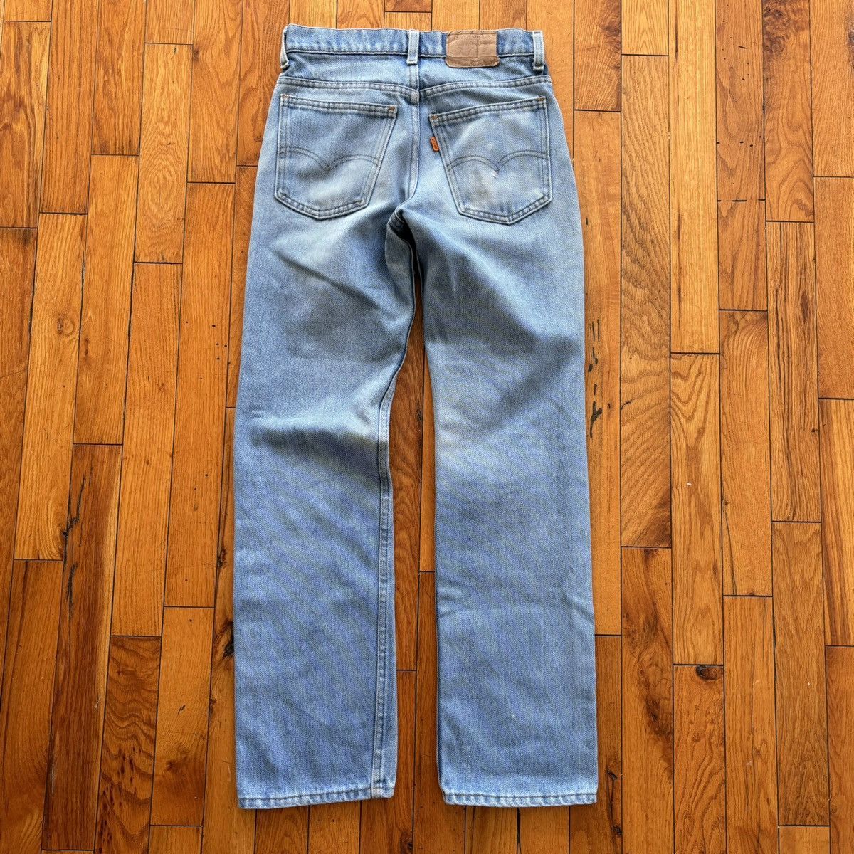image of 70's Orange Tab Levis 916 Jeans in Blue, Women's (Size 24)