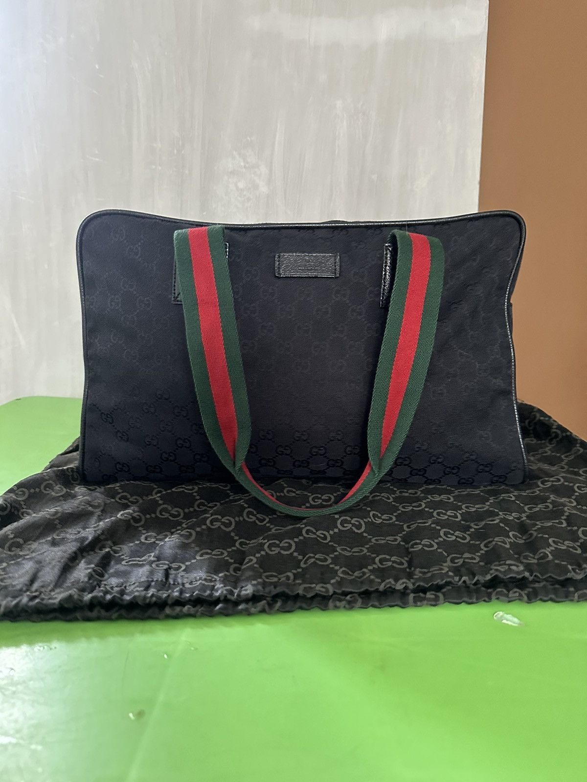 image of Gucci GG Monogram Duffle Bag in Black, Men's