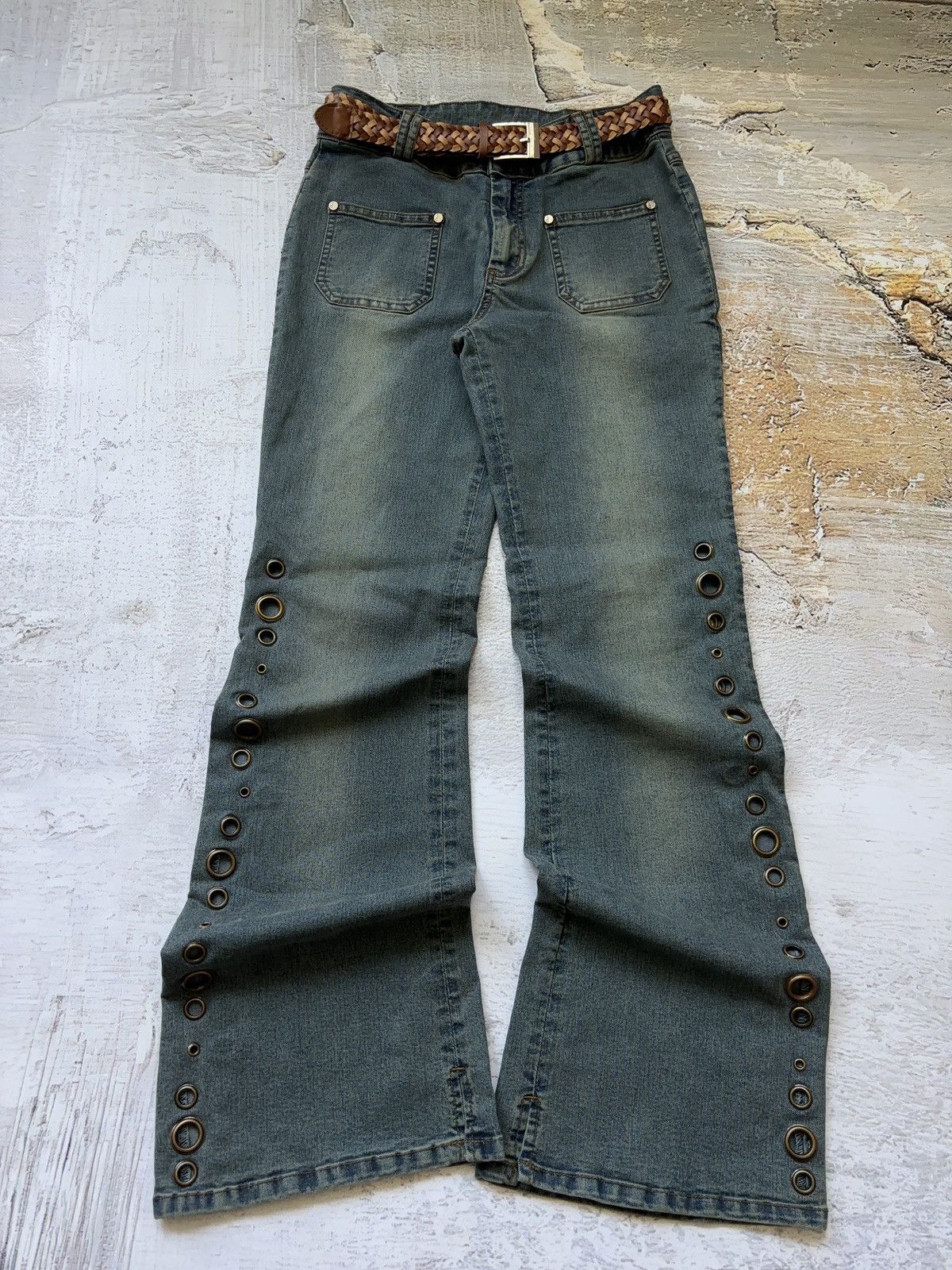 Deadstock vintage flared eyelet jeans belted pants