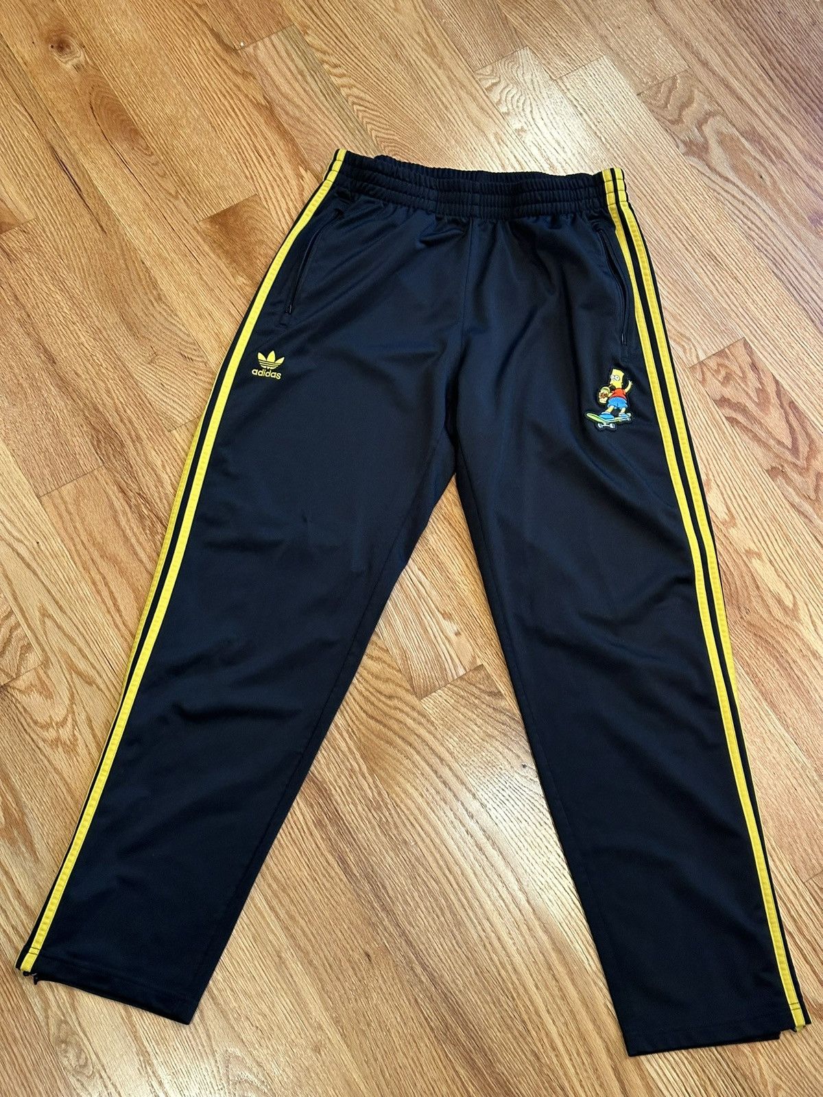 Purchases Adidas Bart Simpson track jacket and pants.